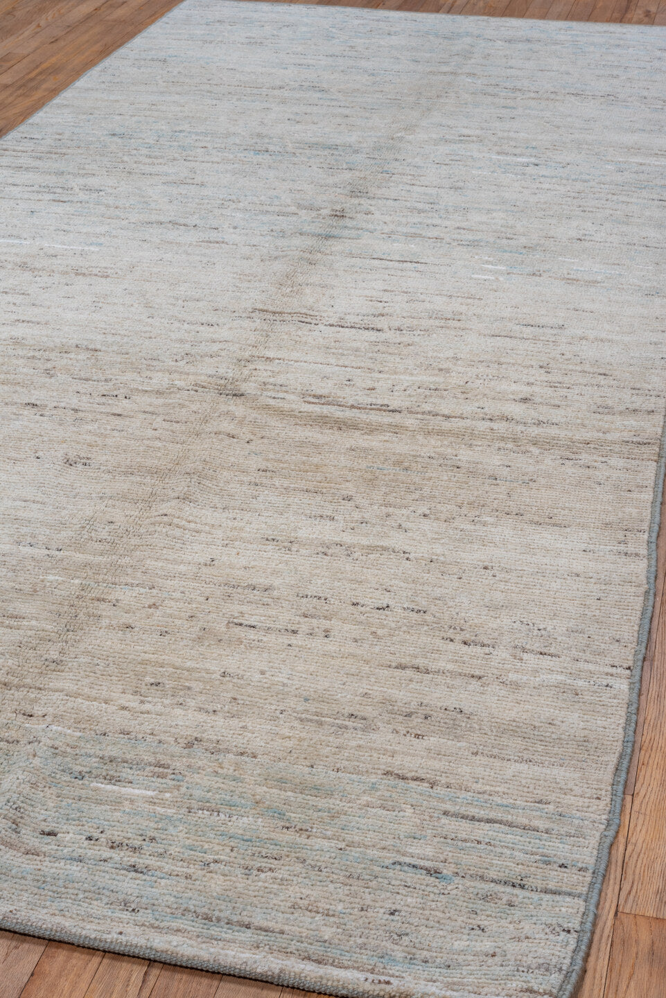 5' x 11' one-of-a-kind handmade vintage Tulu runner rug. Color palette: ivory, pale blue, taupe, gray, cream, light blue