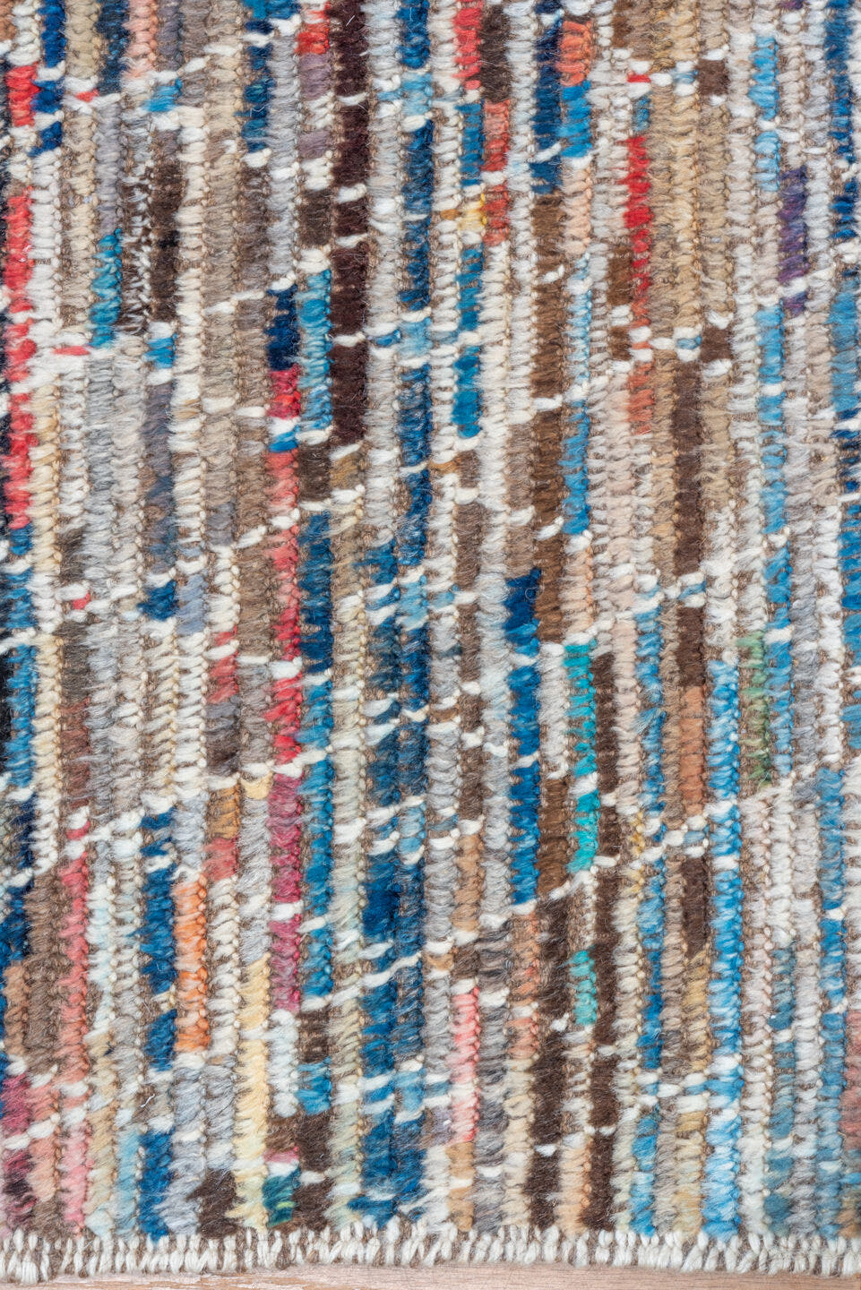 8' x 9' one-of-a-kind handmade vintage Tulu rug. Color palette: ivory, taupe, blue, rust, coral, brown, charcoal, beige