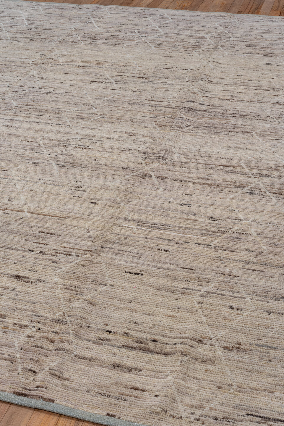 7' x 9' one-of-a-kind handmade vintage Tulu rug. Color palette: ivory, taupe, beige, brown, cream, gray