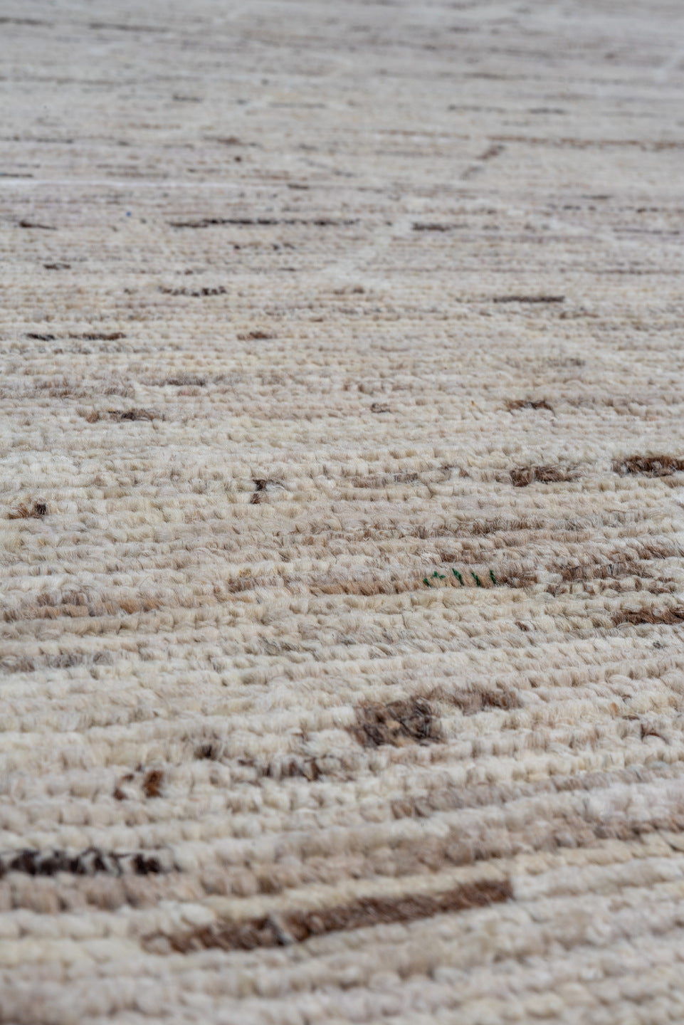 7' x 9' one-of-a-kind handmade vintage Tulu rug. Color palette: ivory, taupe, beige, brown, cream, gray