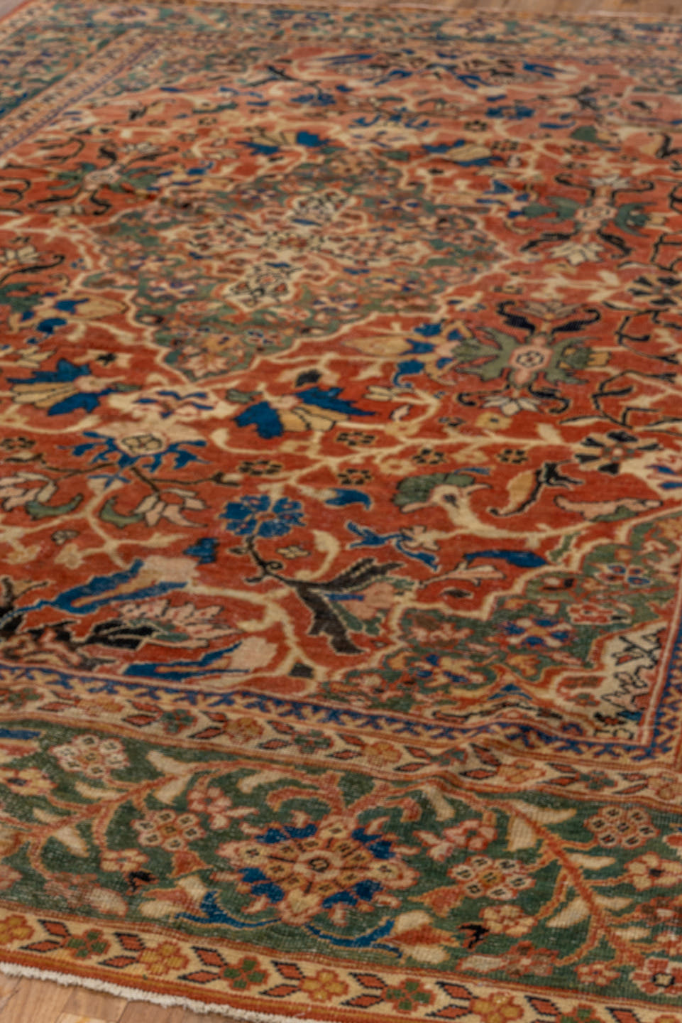 9' x 12' one-of-a-kind handmade vintage Mahal large size rug. Color palette: terra cotta, teal, ivory, navy, sage, rust