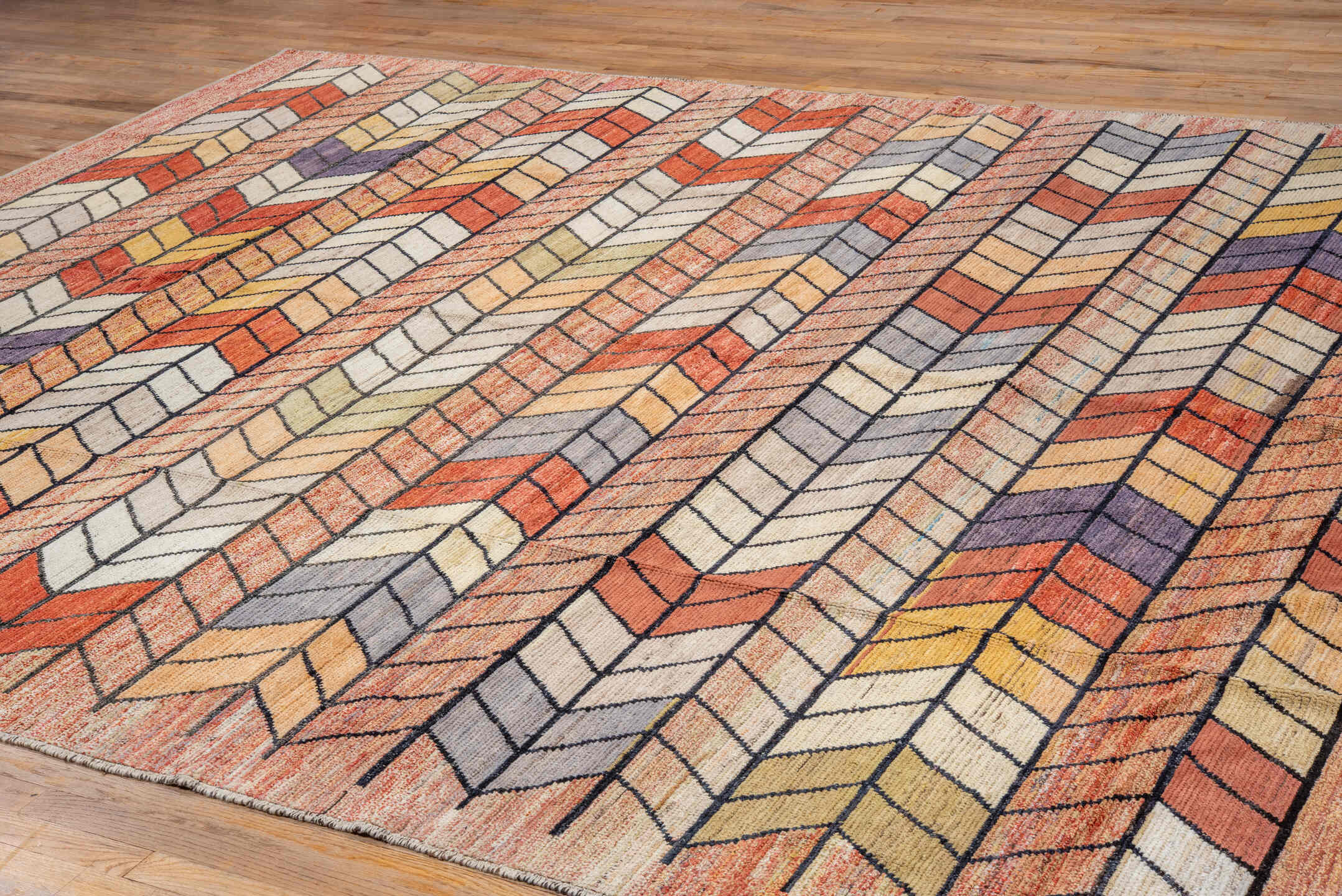 9' x 12' one-of-a-kind handmade vintage Tulu large size rug. Color palette: terra cotta, ivory, rust, peach, gold, violet