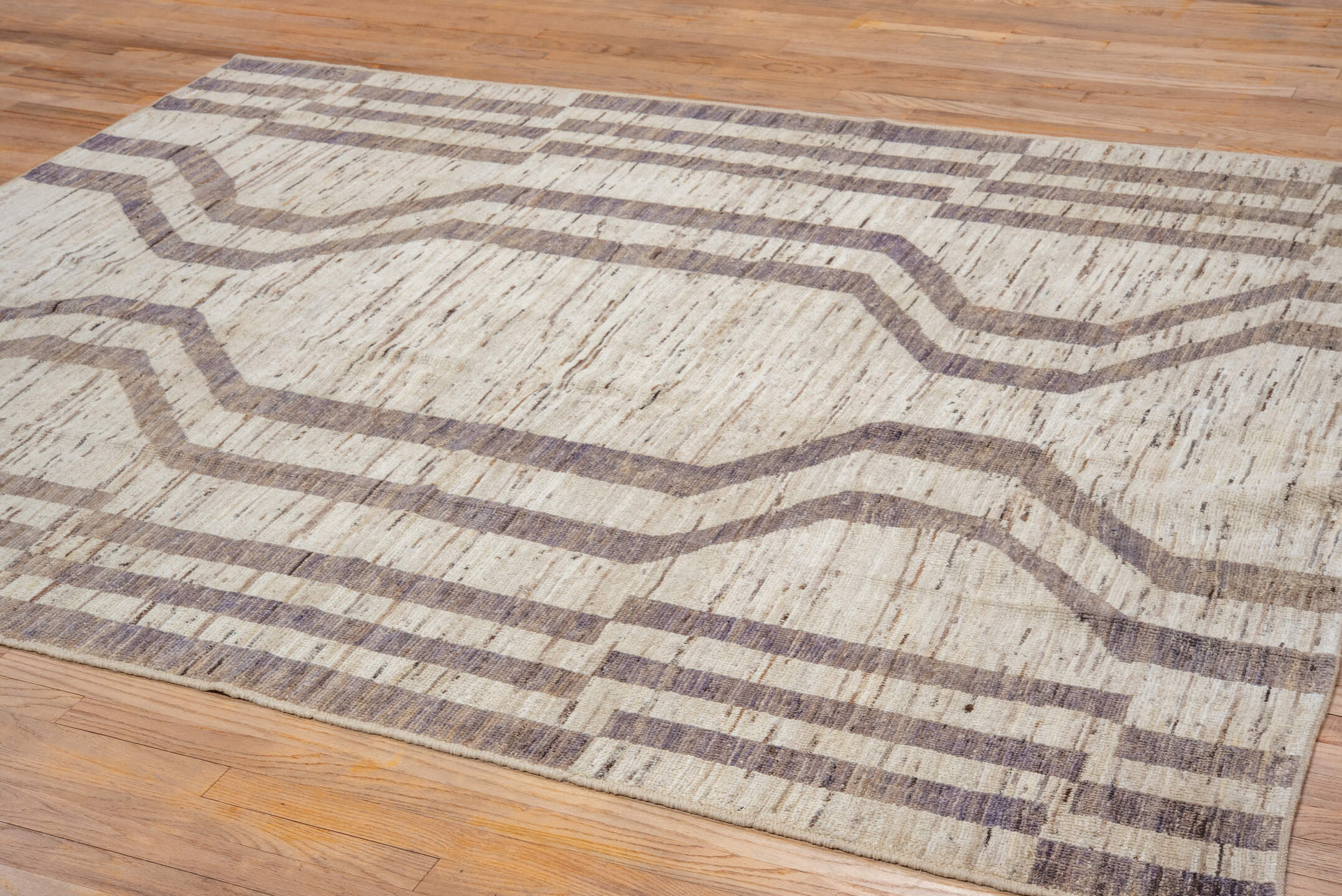 6' x 8' one-of-a-kind handmade vintage Tulu medium size rug. Color palette: brown, gray, light gray, off-white, pink