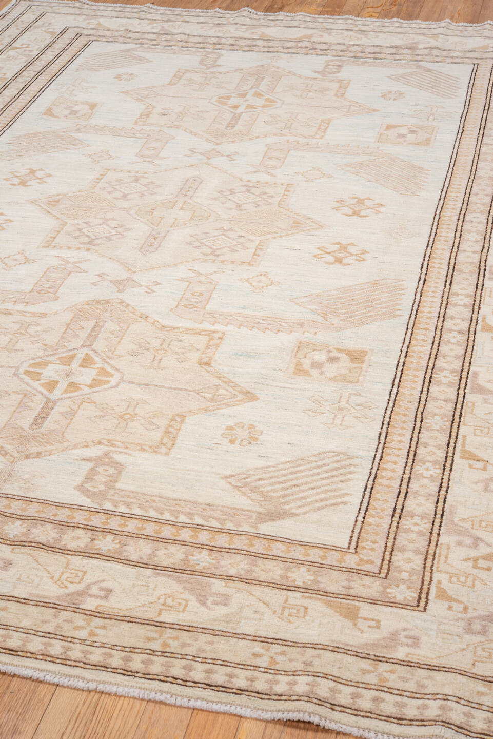 5' x 8' one-of-a-kind handmade vintage Sivas medium size rug. Color palette: ivory, beige, taupe, camel, pale blue, sand