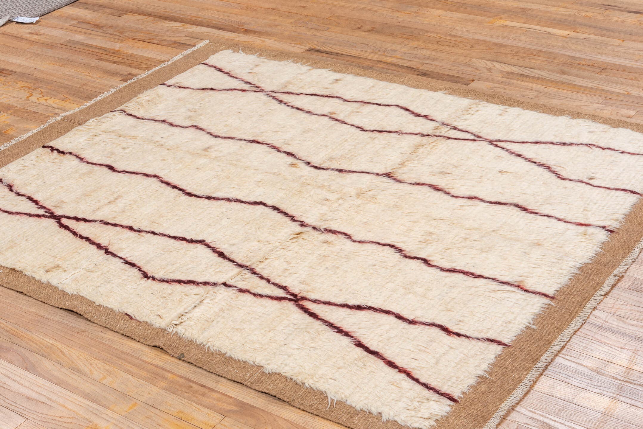 5' x 6' one-of-a-kind handmade vintage Moroccan rug. Color palette: ivory, camel, burgundy, cream, beige
