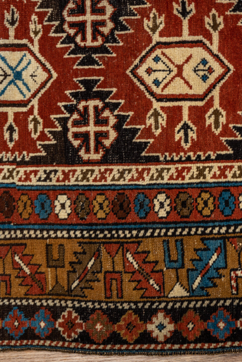 3' x 4' one-of-a-kind handmade vintage Shirvan small size rug. Color palette: rust, camel, ivory, black, sky blue