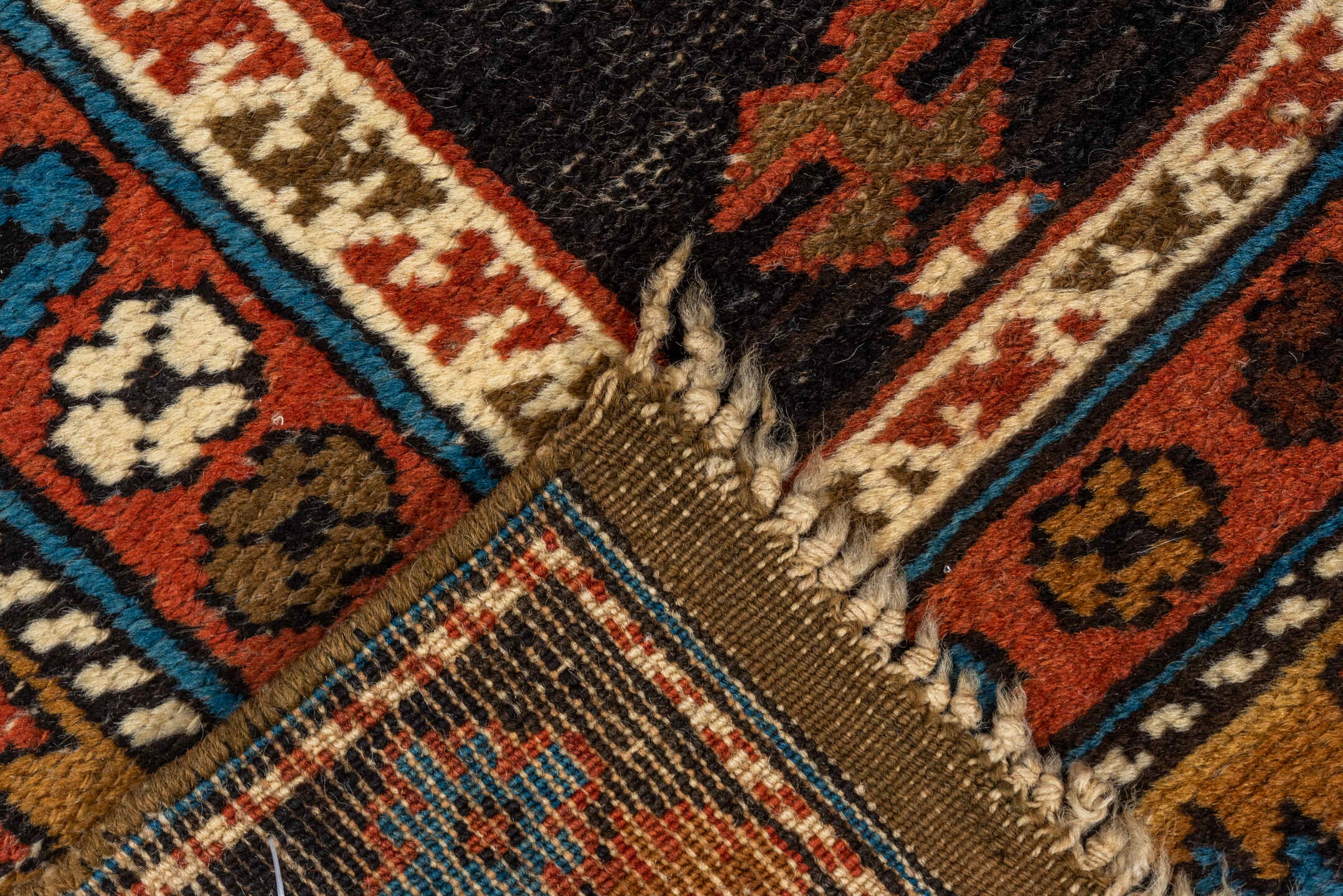 3' x 4' one-of-a-kind handmade vintage Shirvan small size rug. Color palette: rust, camel, ivory, black, sky blue