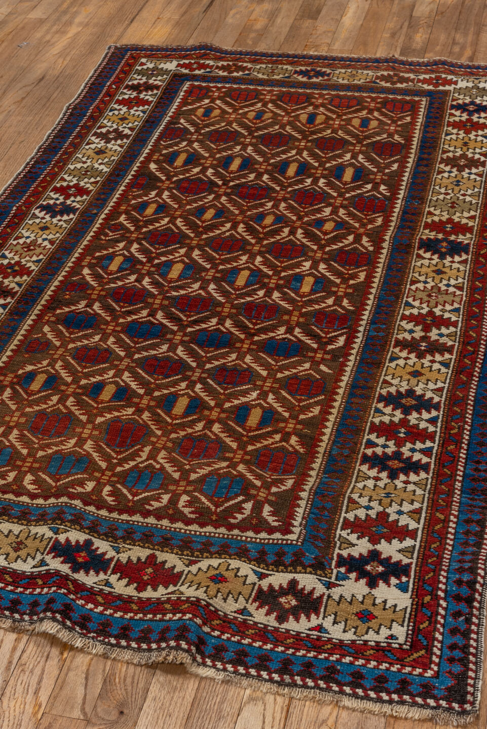 3' x 5' one-of-a-kind handmade vintage Shirvan small size rug. Color palette: blue, brown, dark gray, dark red, gray
