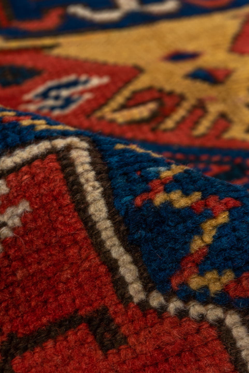 3' x 6' one-of-a-kind handmade vintage Kazak small size rug. Color palette: rust, ivory, navy, gold, crimson, camel, teal