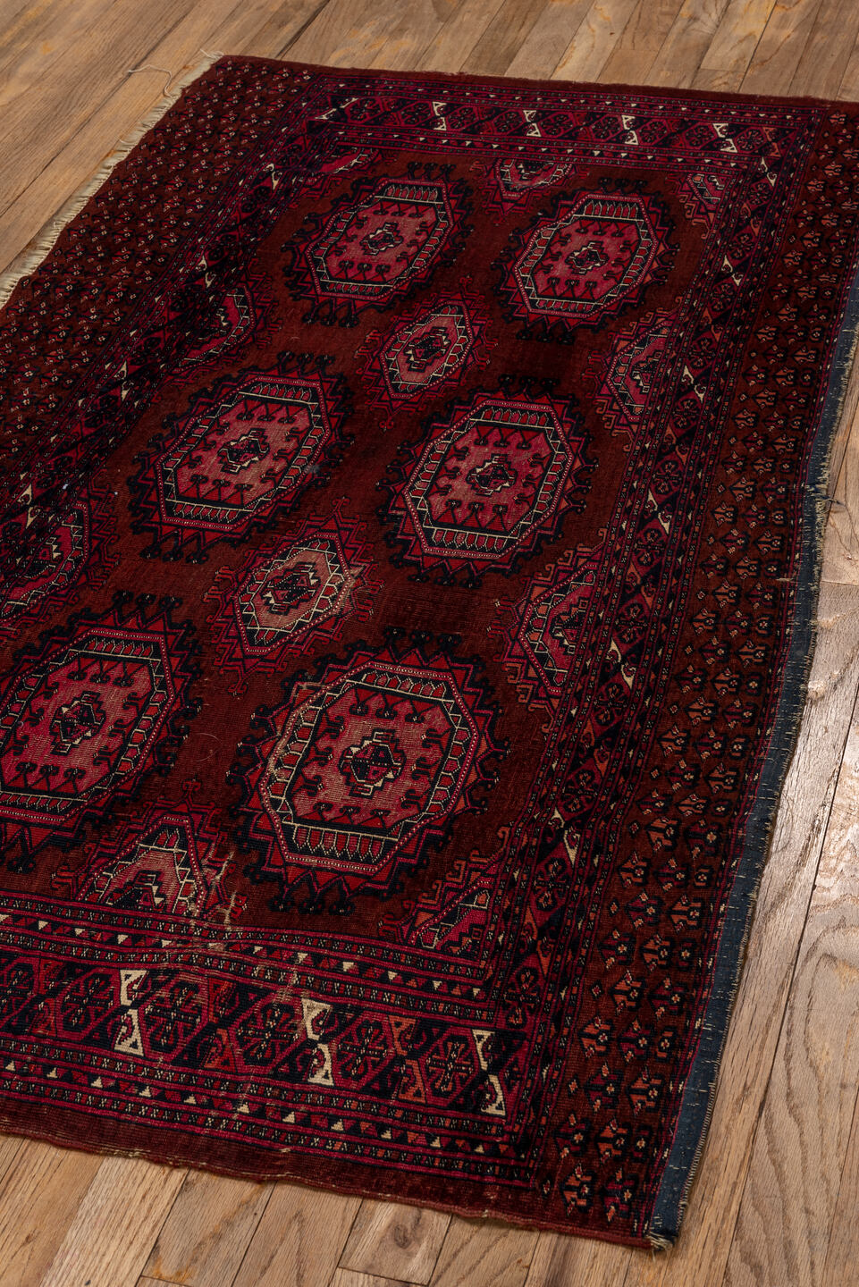 2' x 5' one-of-a-kind handmade vintage Teke small size rug. Color palette: brown, gray, pink, red