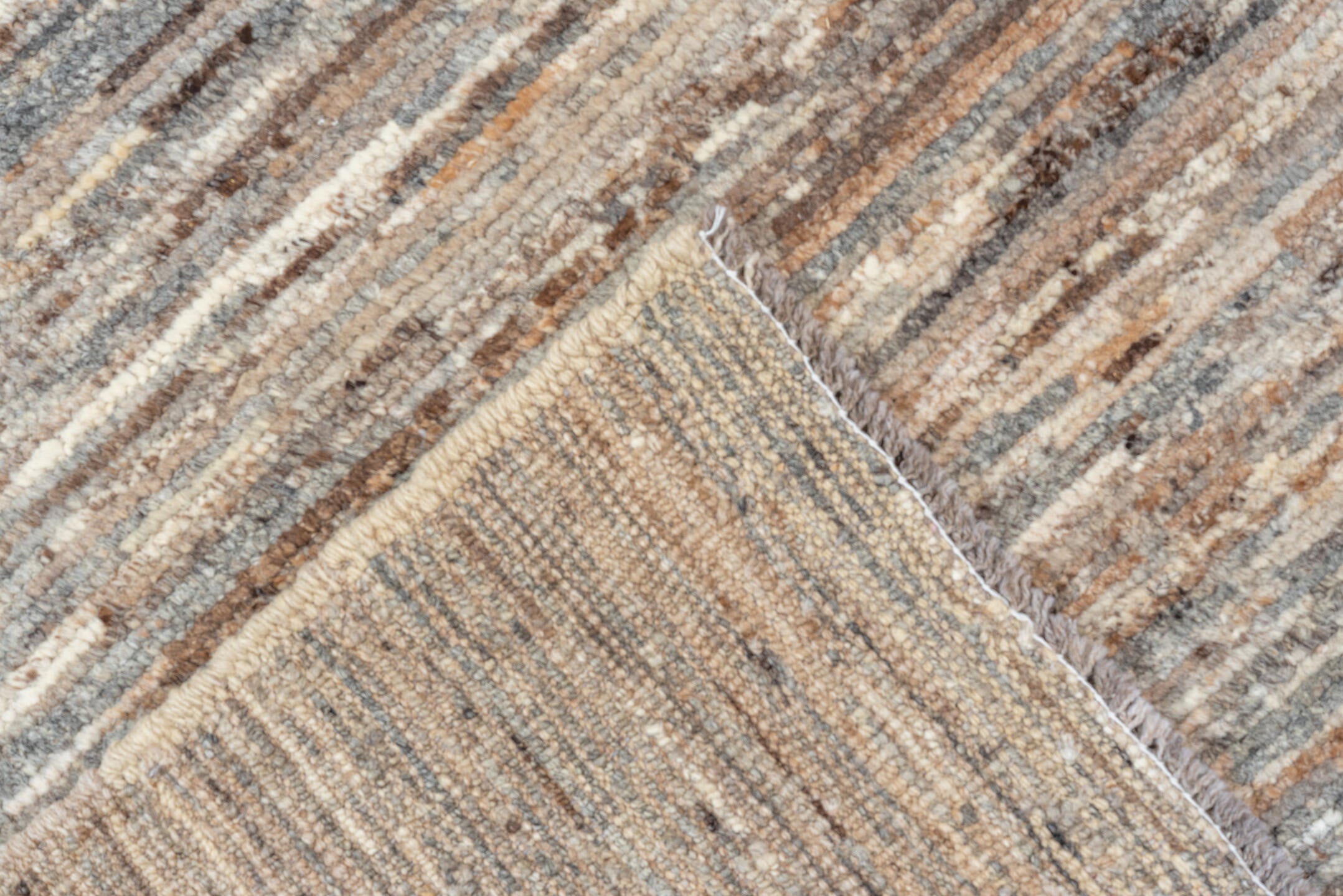 3' x 9' one-of-a-kind handmade vintage Tulu runner rug. Color palette: brown, gray, light gray, off-white