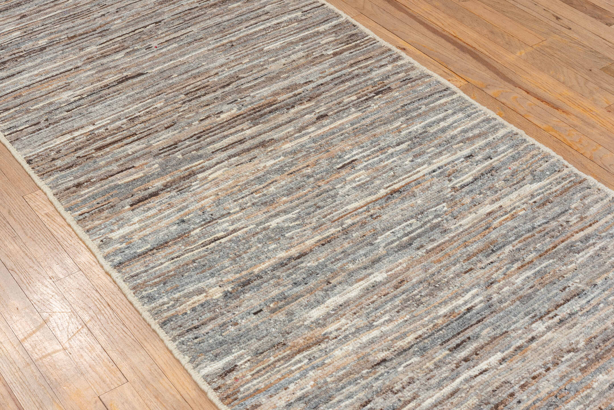 3' x 9' one-of-a-kind handmade vintage Tulu runner rug. Color palette: brown, gray, light gray, off-white