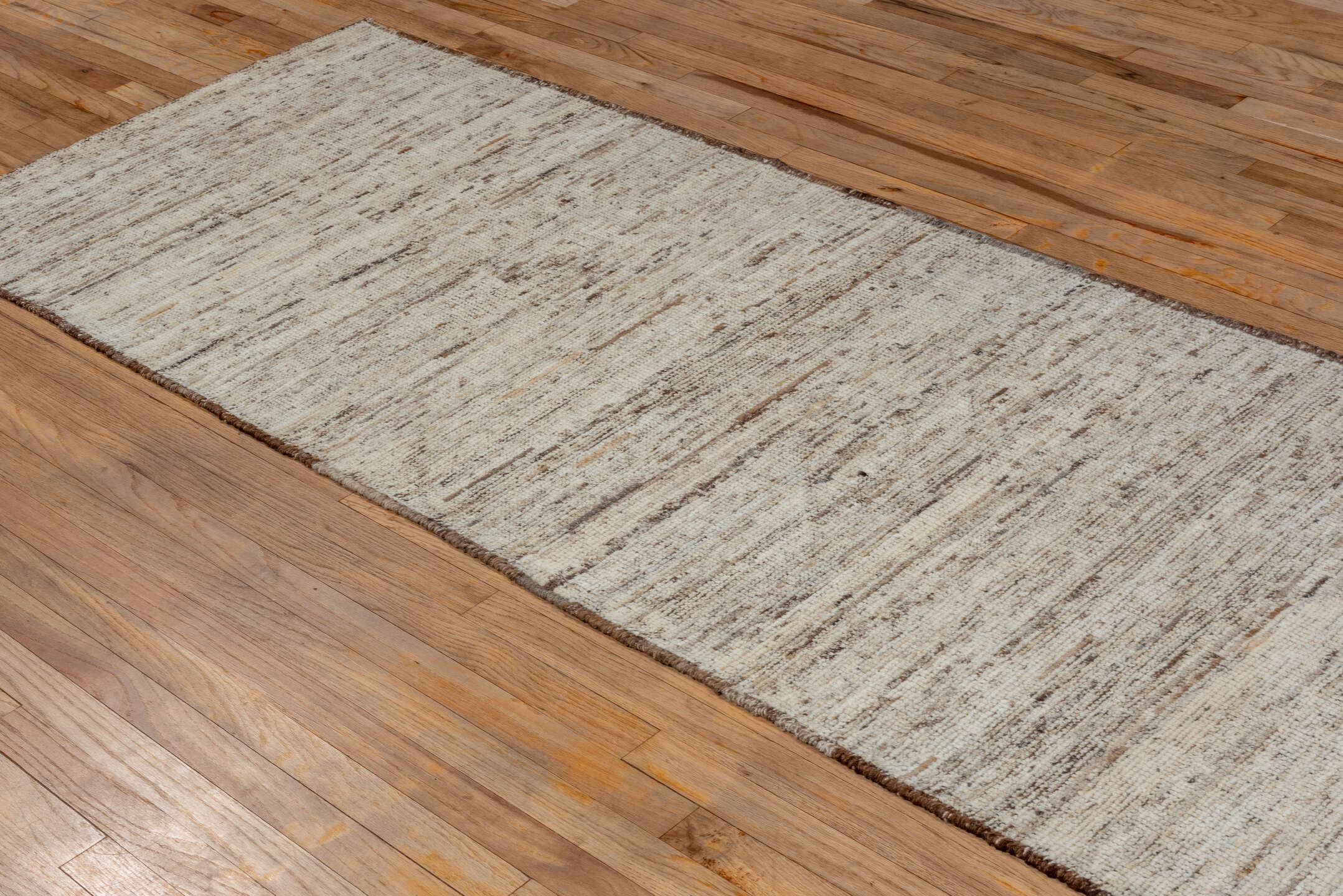 3' x 9' one-of-a-kind handmade vintage Tulu runner rug. Color palette: brown, gray, light gray, off-white
