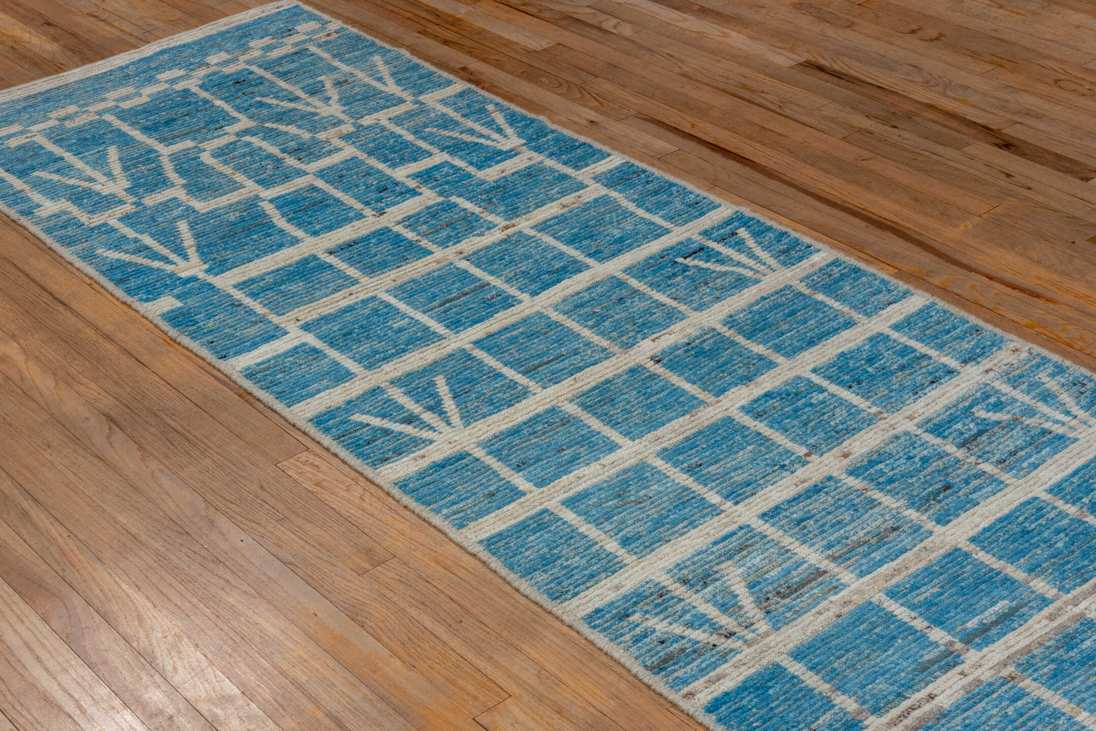 3' x 11' one-of-a-kind handmade vintage Tulu runner rug. Color palette: arapawa, blue, dark gray, gray, light blue