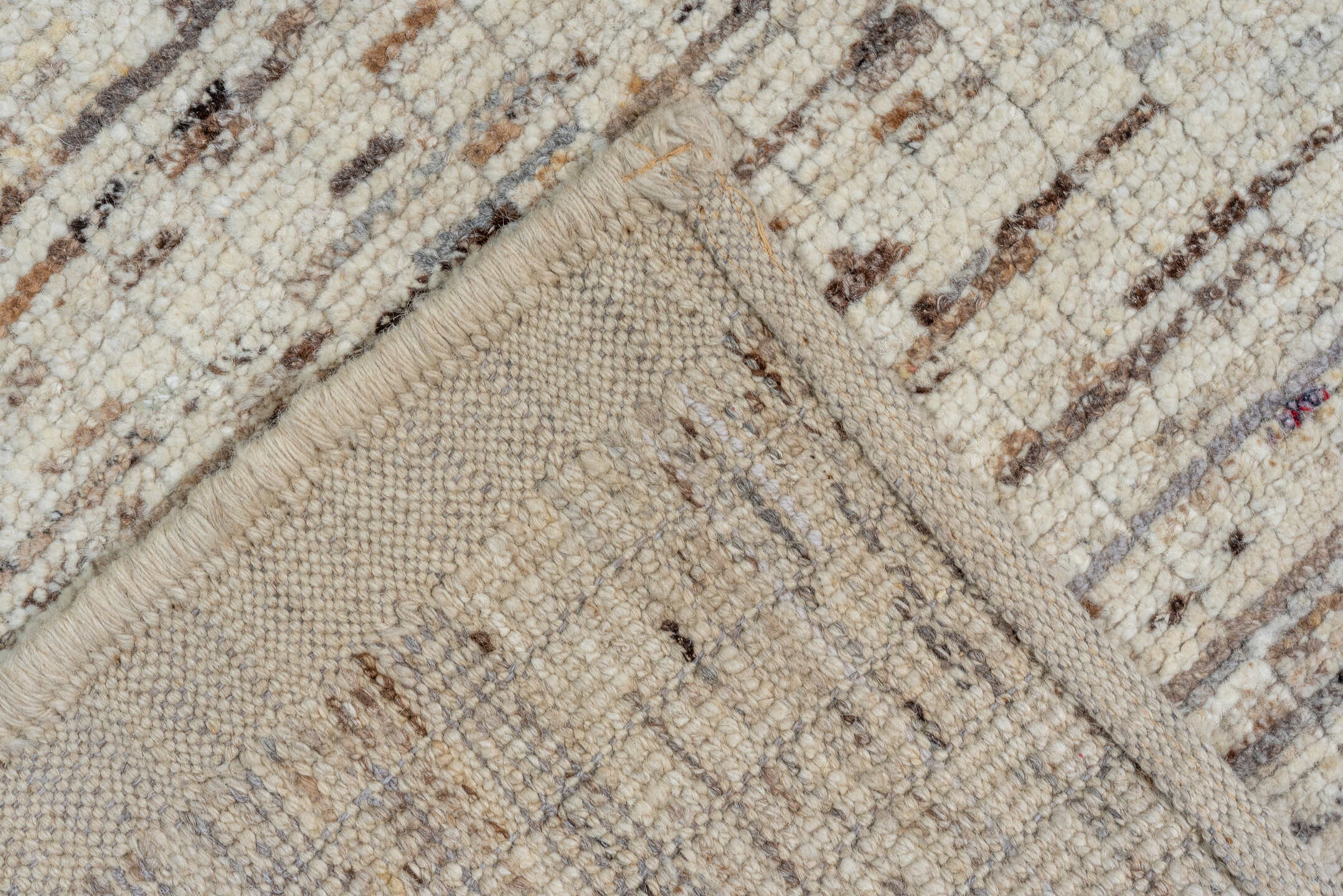 9' x 11' one-of-a-kind handmade vintage Tulu large size rug. Color palette: ivory, taupe, brown, gray, charcoal, beige