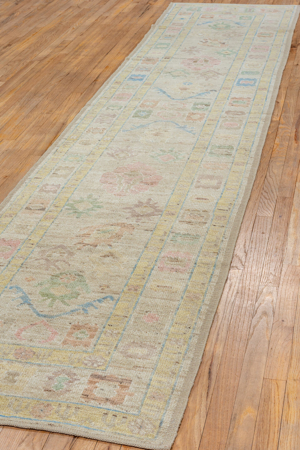 2' x 13' one-of-a-kind handmade vintage Tulu runner rug. Color palette: ivory, beige, pale blue, blush, sage, muted gold