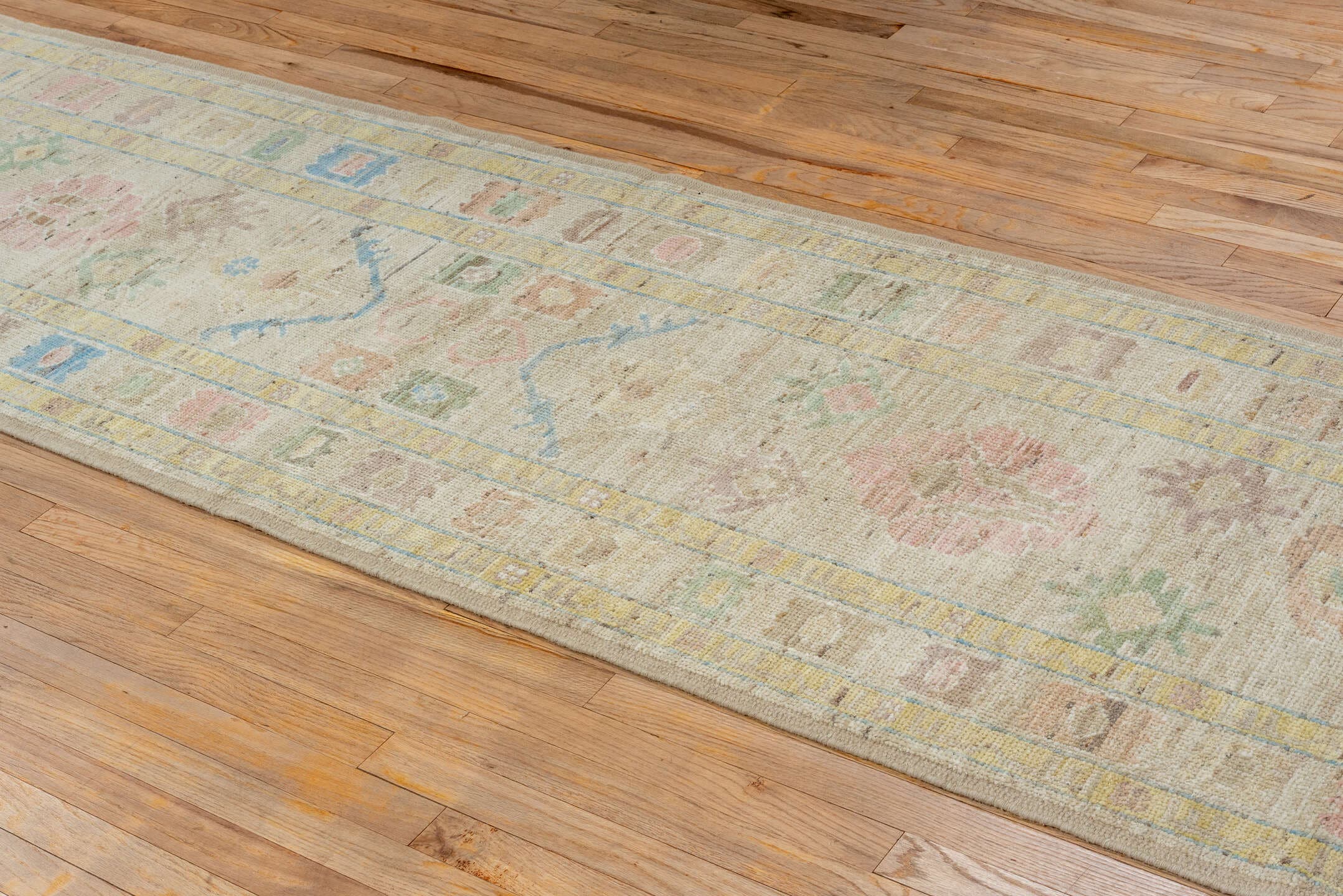 2' x 13' one-of-a-kind handmade vintage Tulu runner rug. Color palette: ivory, beige, pale blue, blush, sage, muted gold