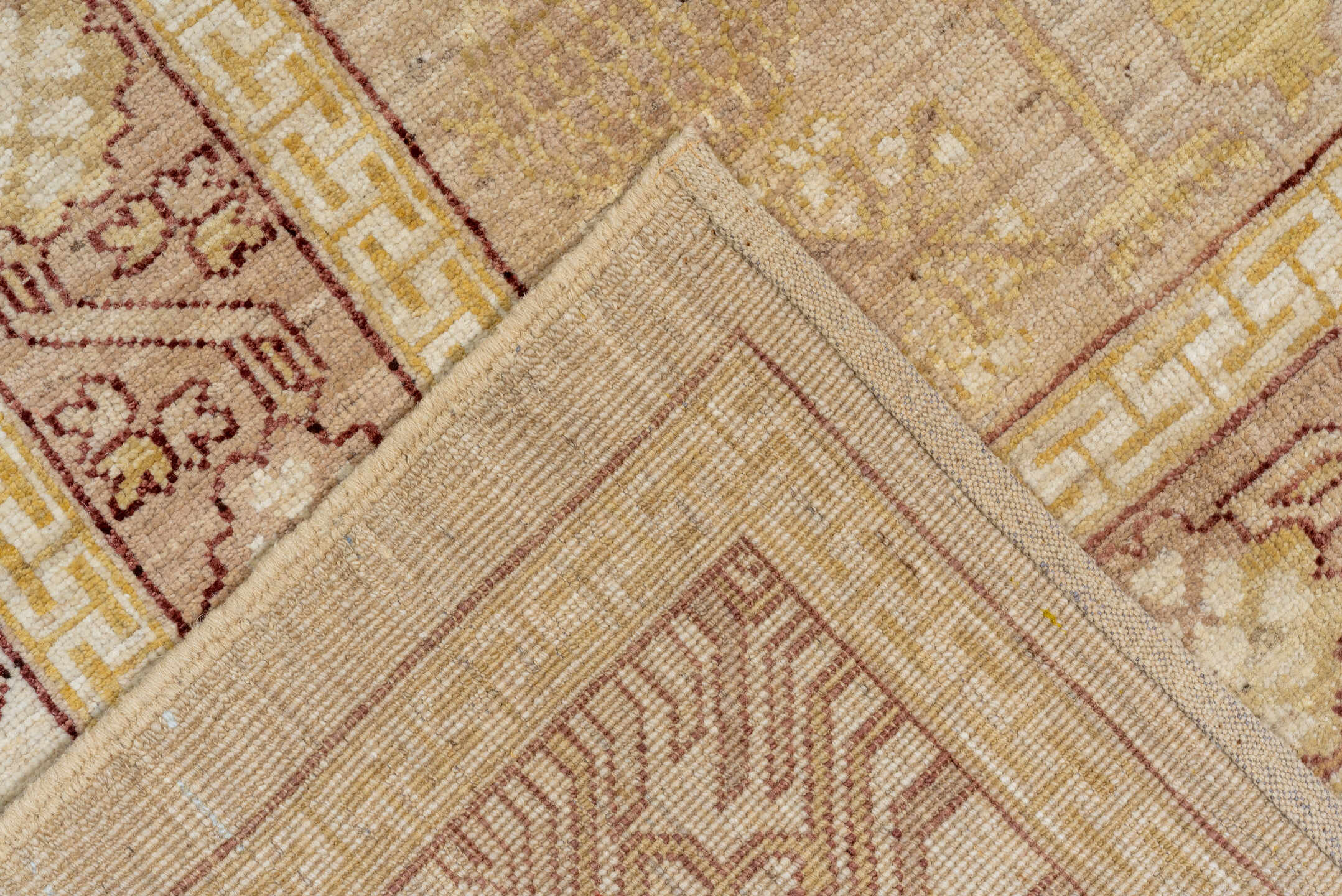 9' x 12' one-of-a-kind handmade vintage Khotan large size rug. Color palette: brown, gray, off-white, orange, pink, snow