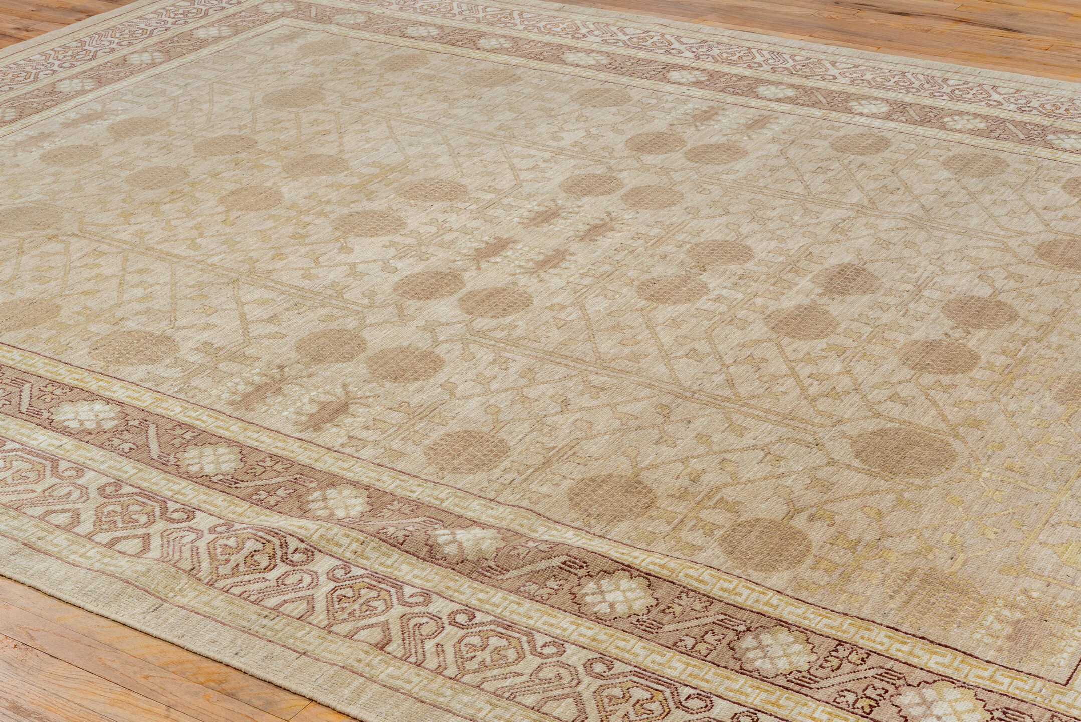 9' x 12' one-of-a-kind handmade vintage Khotan large size rug. Color palette: brown, gray, off-white, orange, pink, snow