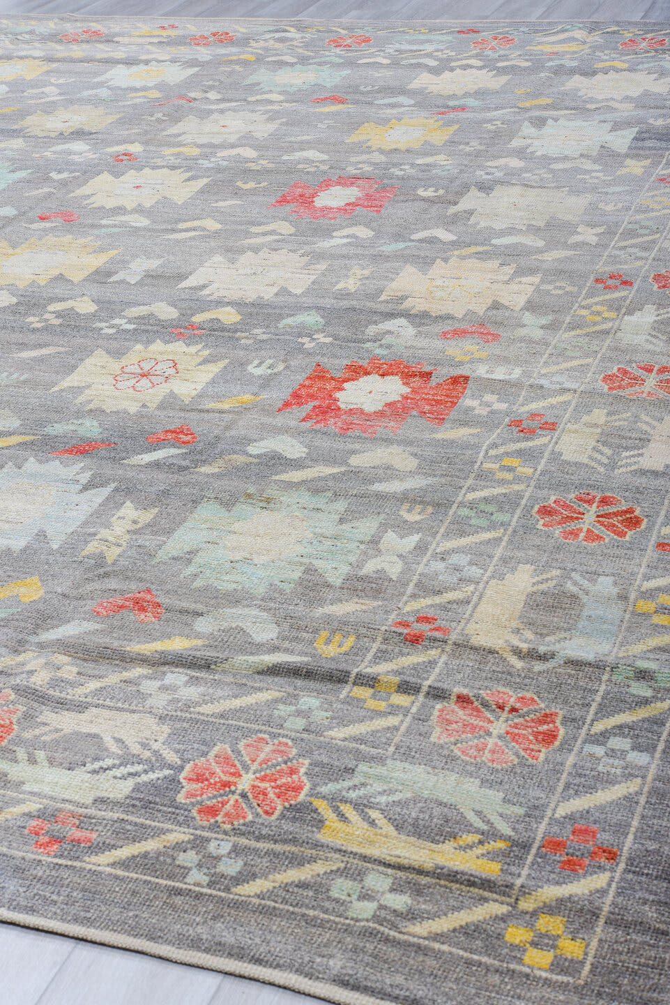 12' x 15' one-of-a-kind handmade vintage Tulu oversize rug. Color palette: blue gray, ivory, aqua, coral, saffron, taupe