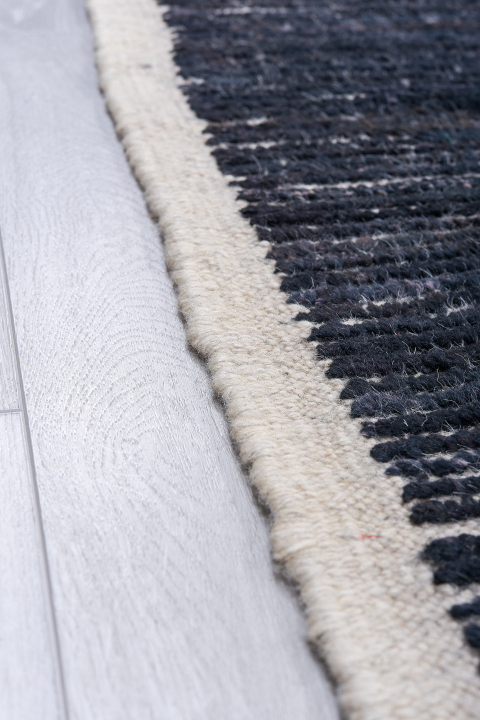 11' x 14' one-of-a-kind handmade vintage Tulu oversize rug. Color palette: charcoal, indigo, ivory, slate, blue gray, black