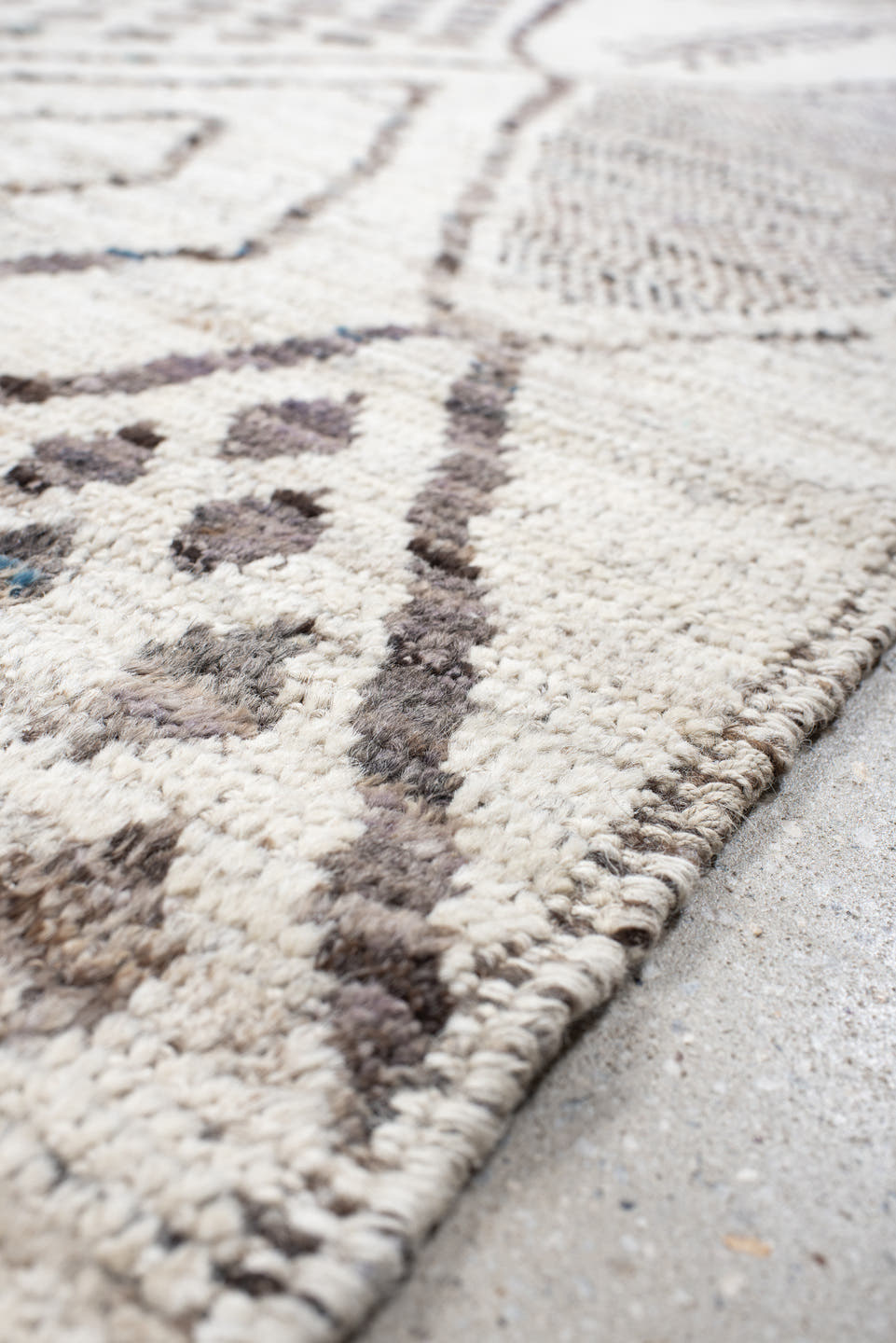 8' x 9' one-of-a-kind handmade vintage Tulu large size rug. Color palette: ivory, taupe, charcoal, gray, cream, beige, black