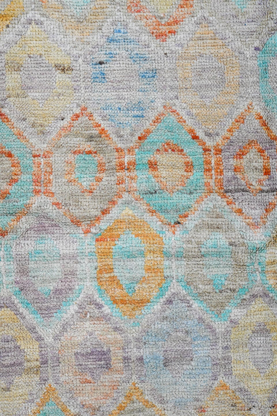 5' x 6' one-of-a-kind handmade vintage Tulu rug. Color palette: ivory, aqua, coral, saffron, lavender, pale blue, taupe