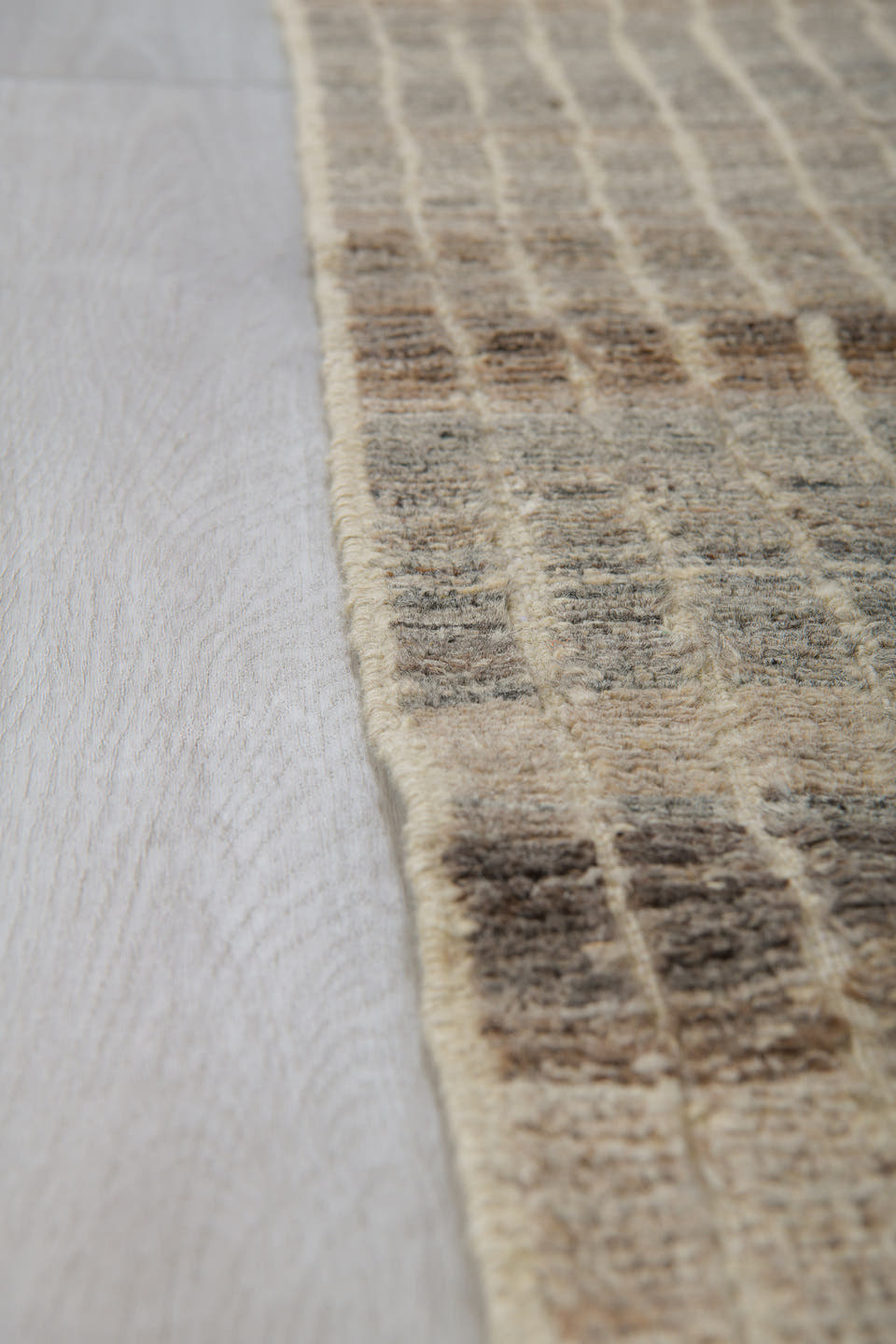 3' x 9' one-of-a-kind handmade vintage Tulu runner rug. Color palette: ivory, taupe, charcoal, camel, gray, brown, beige