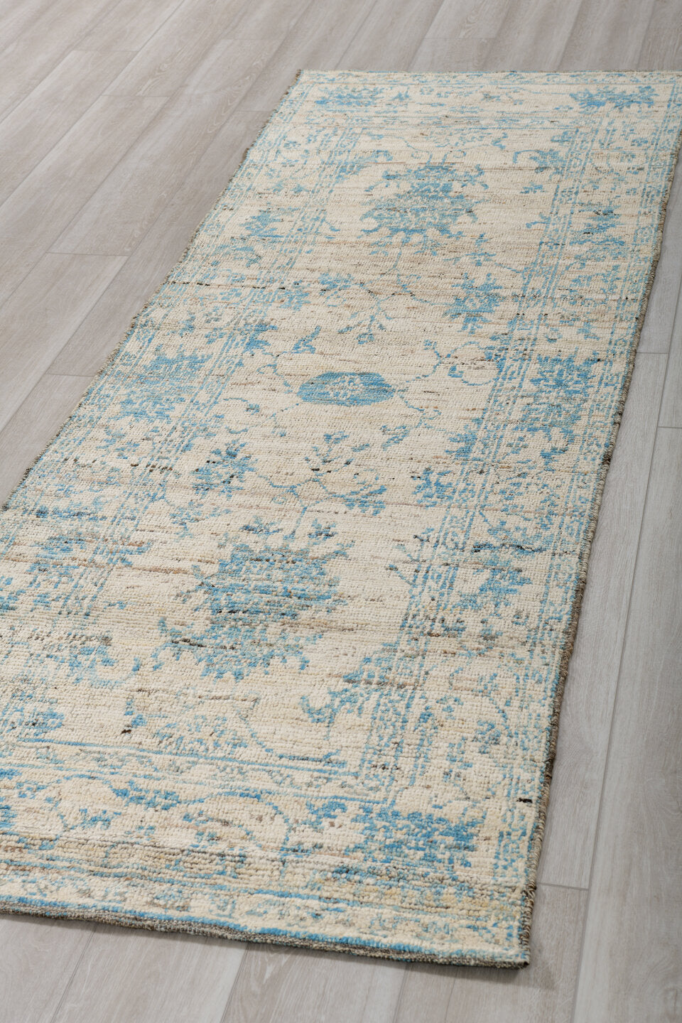 3' x 8' one-of-a-kind handmade vintage Tulu runner rug. Color palette: ivory, sky blue, taupe, slate, cream, light blue