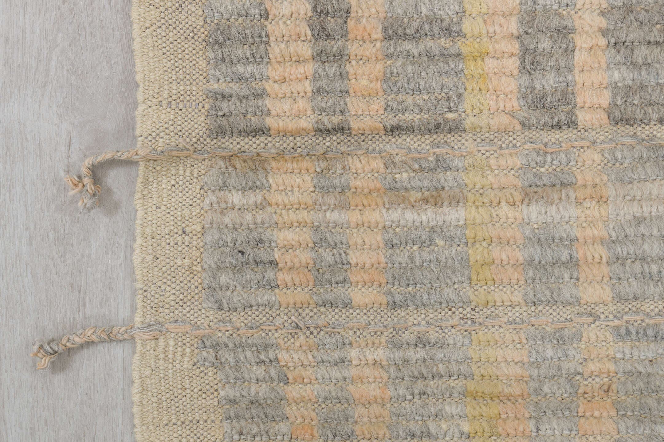 2' x 9' one-of-a-kind handmade vintage Tulu runner rug. Color palette: ivory, pale gold, gray, charcoal, cream, gold, black