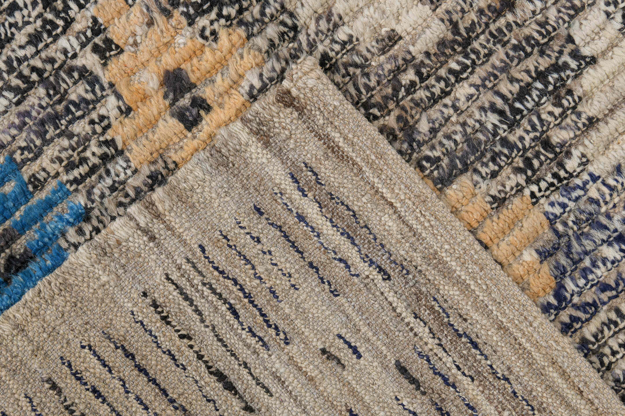 3' x 11' one-of-a-kind handmade vintage Tulu runner rug. Color palette: charcoal, ivory, blue, cream, peach, gray, black