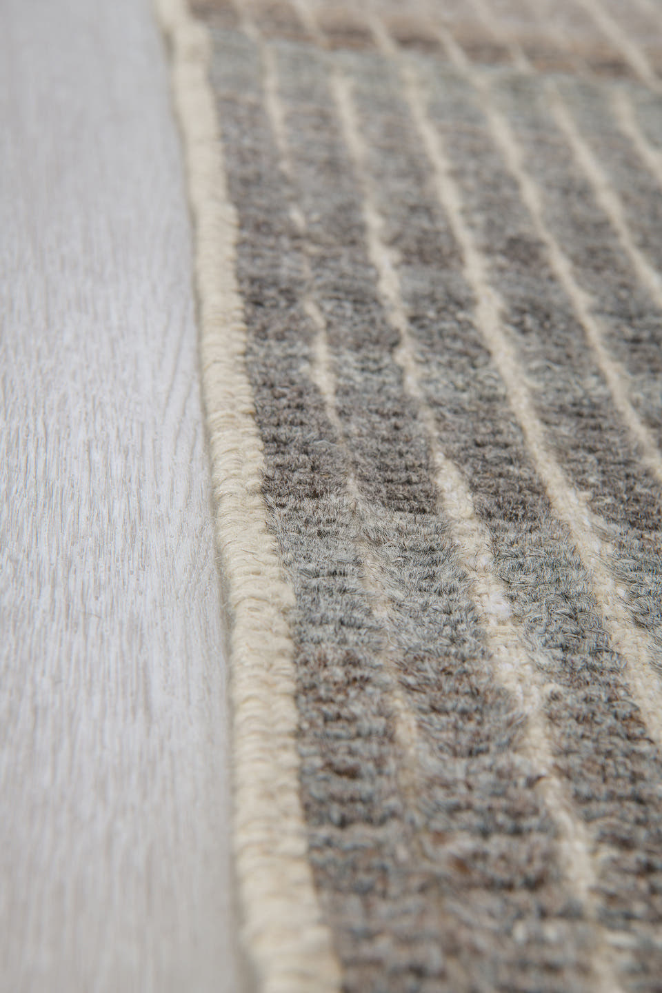 3' x 9' one-of-a-kind handmade vintage Tulu runner rug. Color palette: ivory, gray, taupe, brown, charcoal, beige, black