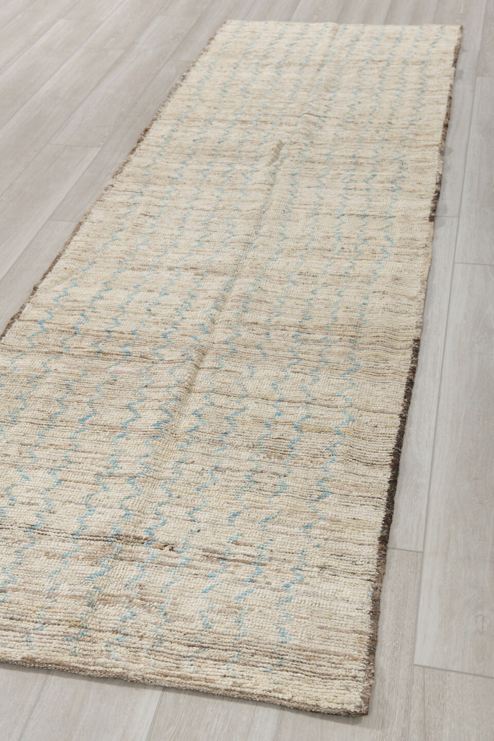 3' x 10' one-of-a-kind handmade vintage Tulu runner rug. Color palette: ivory, blue gray, taupe, charcoal, gray, blue, beige