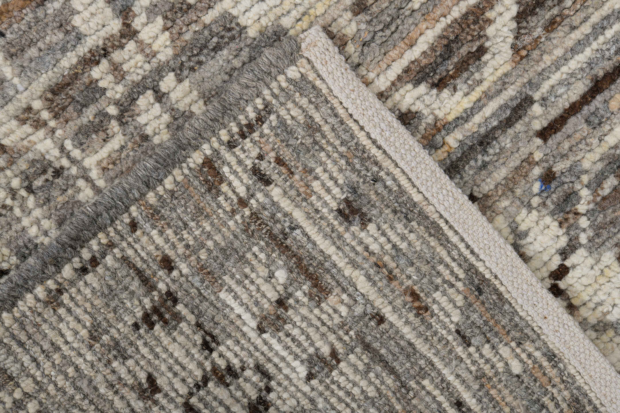 3' x 8' one-of-a-kind handmade vintage Tulu runner rug. Color palette: brown, dark gray, gray, light gray, off-white, silver