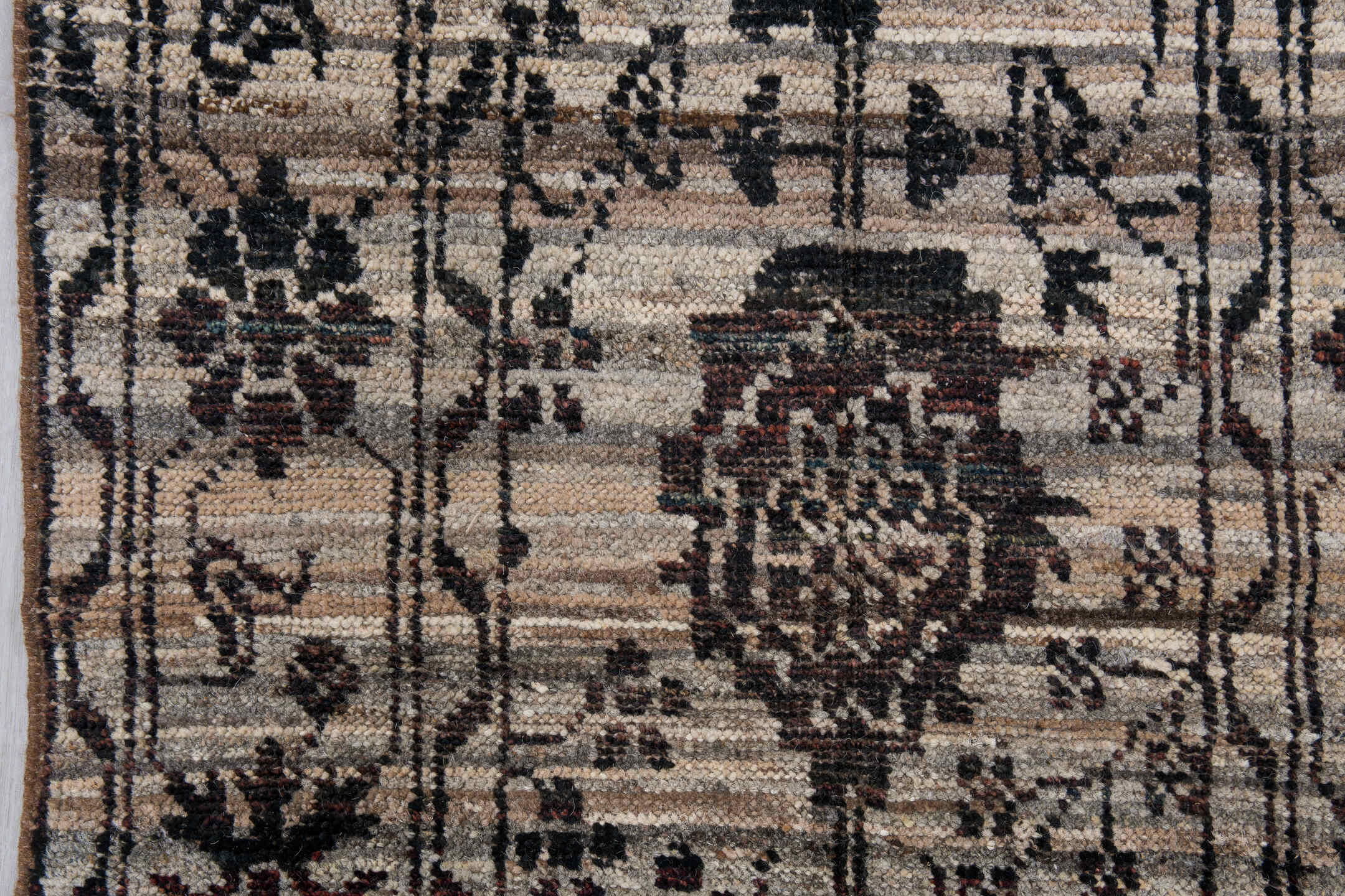 2' x 9' one-of-a-kind handmade vintage Tulu runner rug. Color palette: ivory, charcoal, taupe, brown, burgundy, black, gray