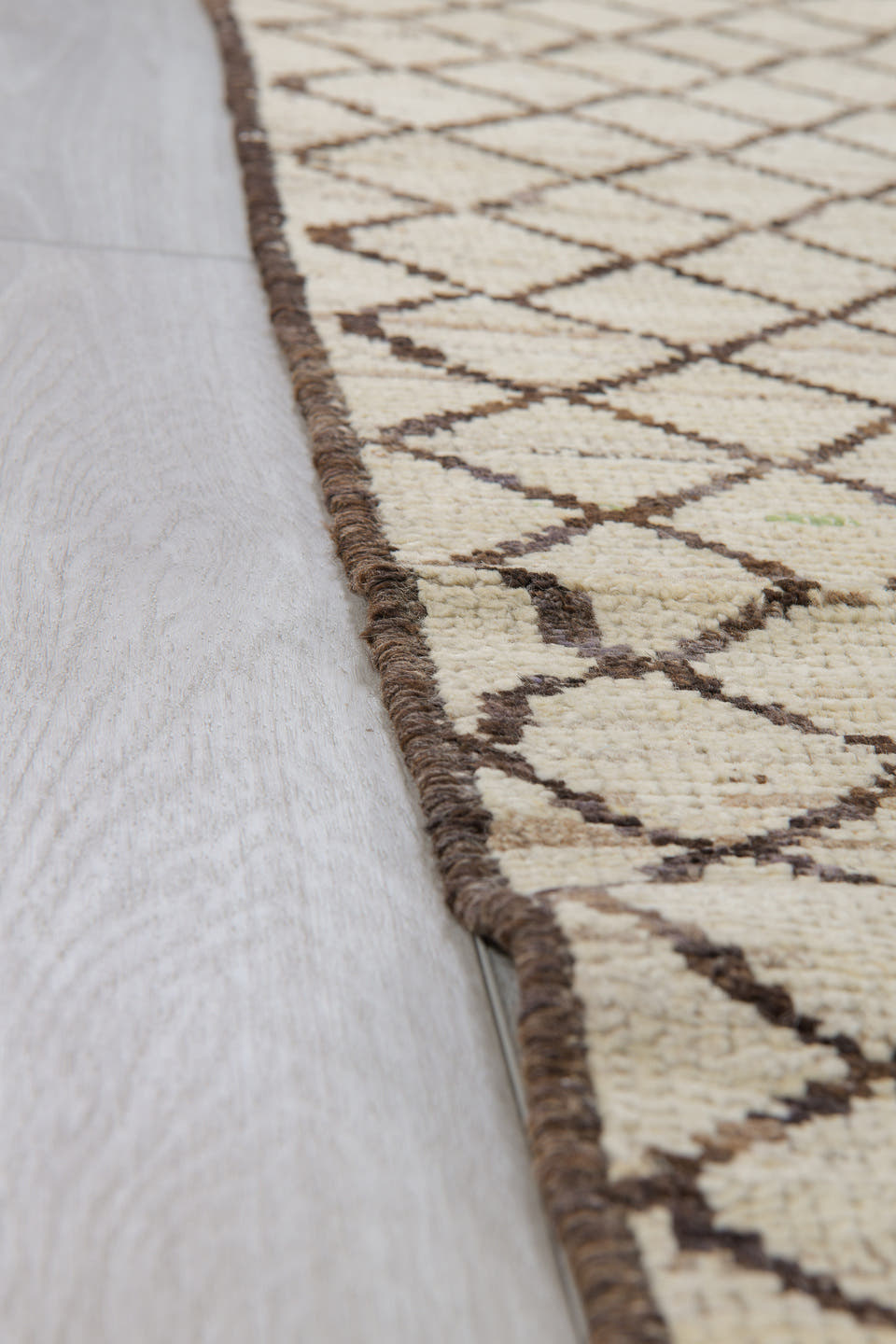 2' x 9' one-of-a-kind handmade vintage Tulu runner rug. Color palette: ivory, brown, taupe, beige, gray