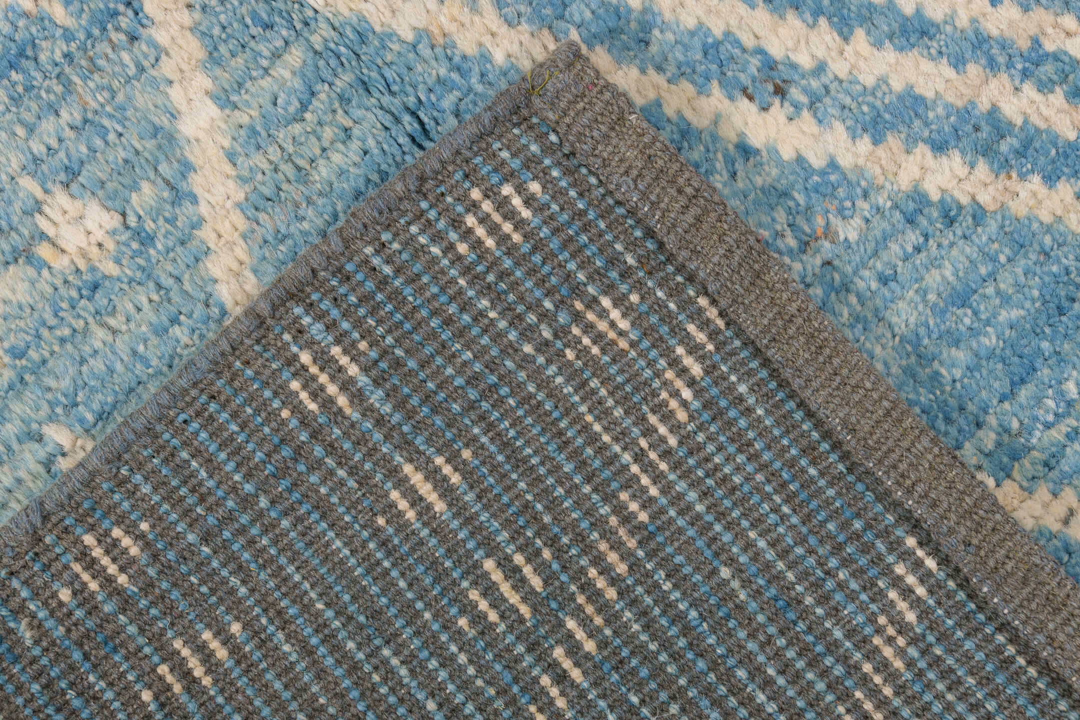 2' x 9' one-of-a-kind handmade vintage Tulu runner rug. Color palette: blue, gray, light blue, light gray, off-white