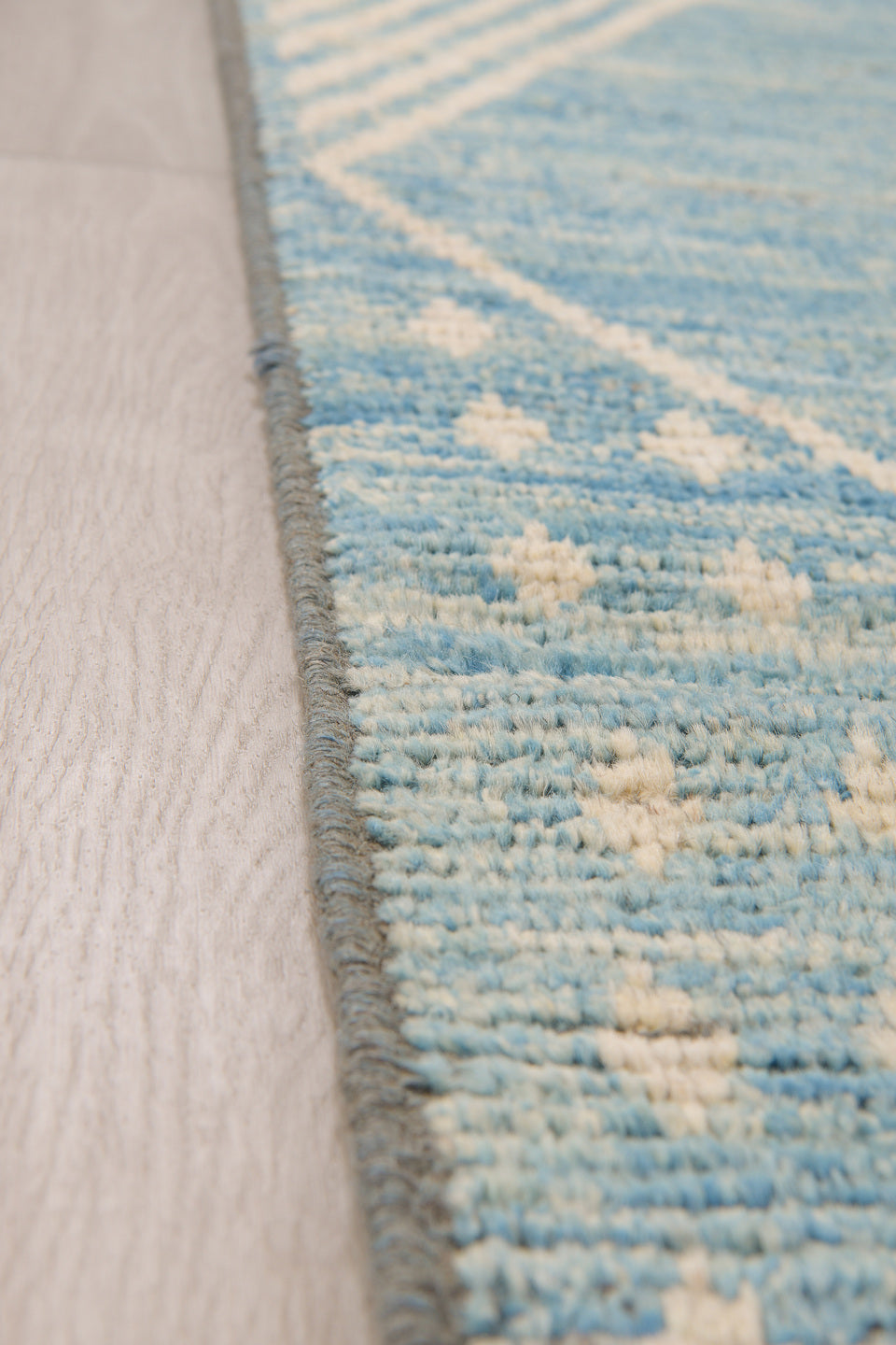 2' x 9' one-of-a-kind handmade vintage Tulu runner rug. Color palette: blue, gray, light blue, light gray, off-white