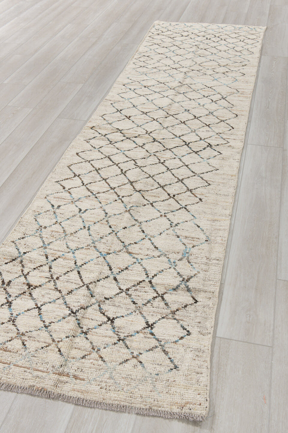 3' x 11' one-of-a-kind handmade vintage Tulu runner rug. Color palette: ivory, charcoal, pale blue, taupe, cream, black