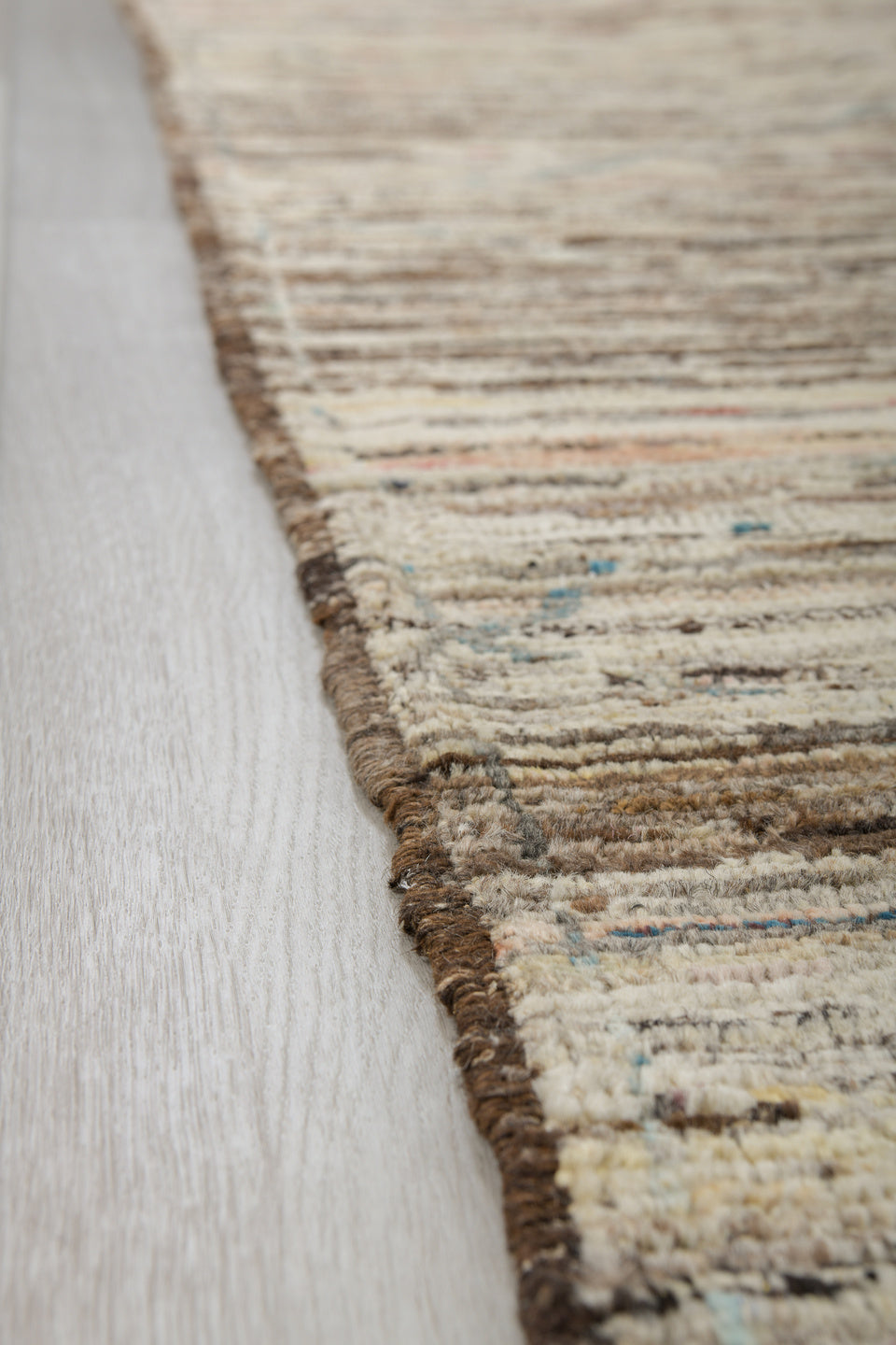 3' x 10' one-of-a-kind handmade vintage Tulu runner rug. Color palette: black, brown, gray, light gray, off-white, silver