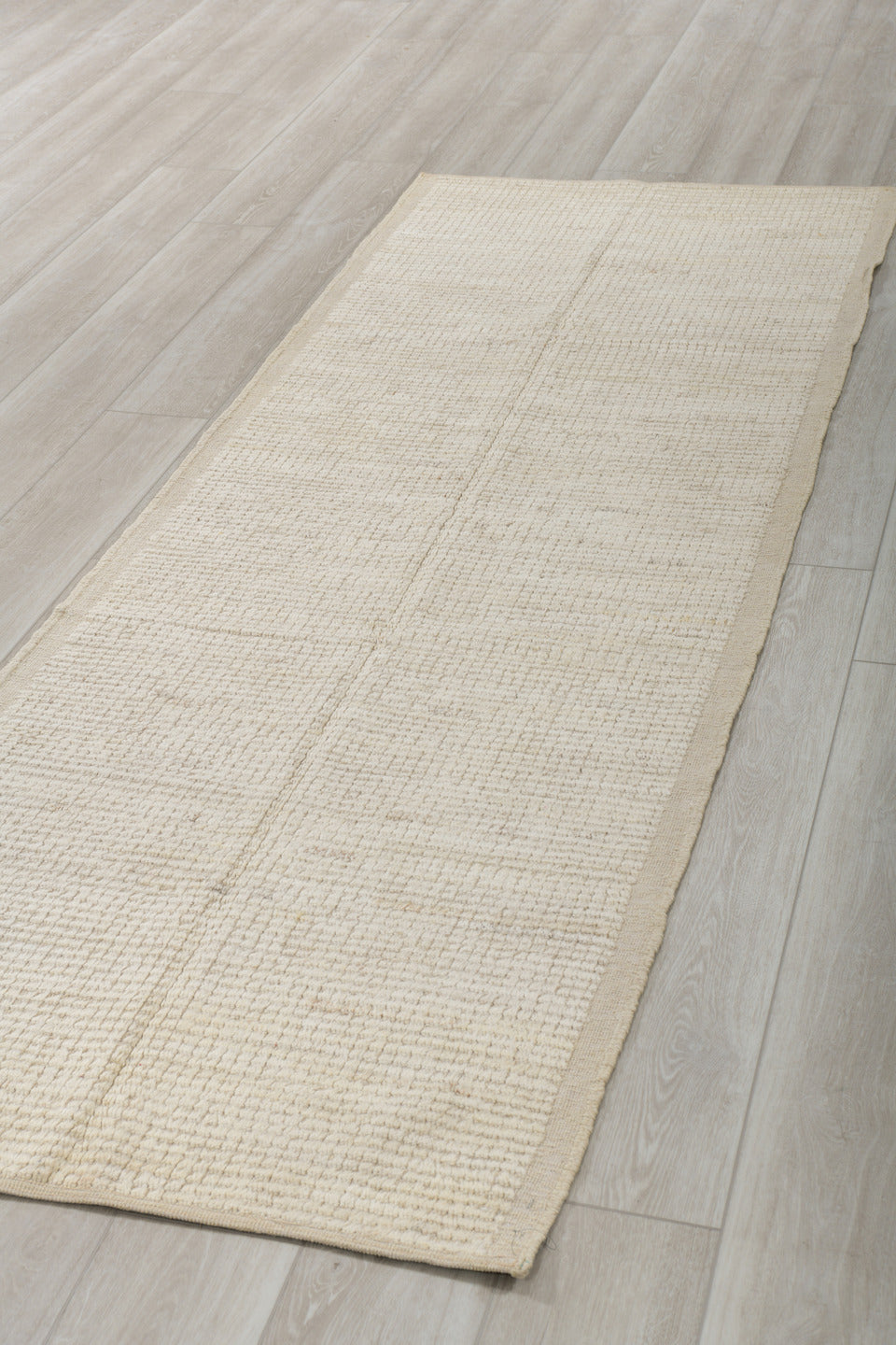 3' x 9' one-of-a-kind handmade vintage Tulu runner rug. Color palette: ivory, cream, beige