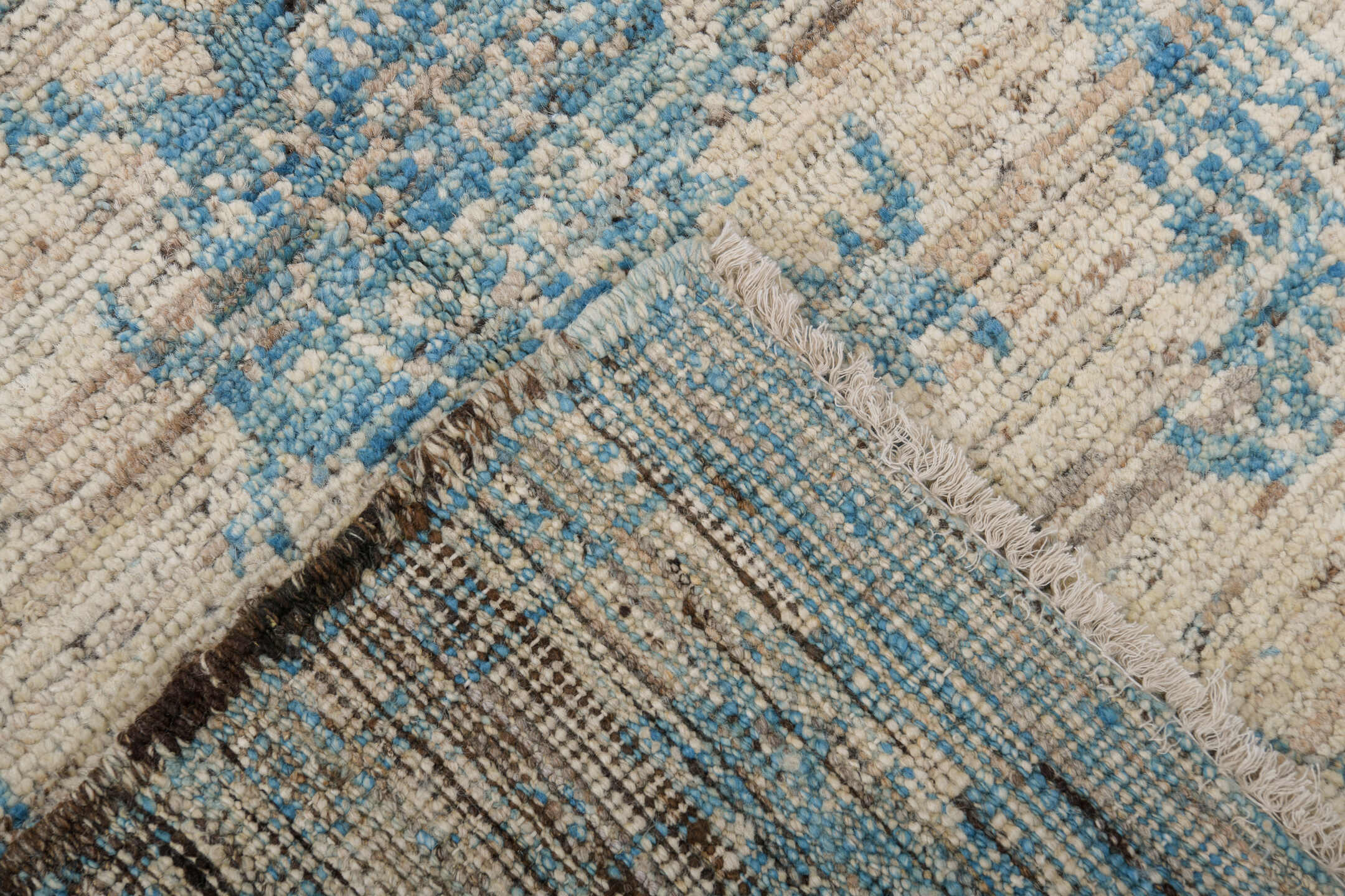 3' x 8' one-of-a-kind handmade vintage Tulu runner rug. Color palette: ivory, sky blue, charcoal, taupe, light blue, gray