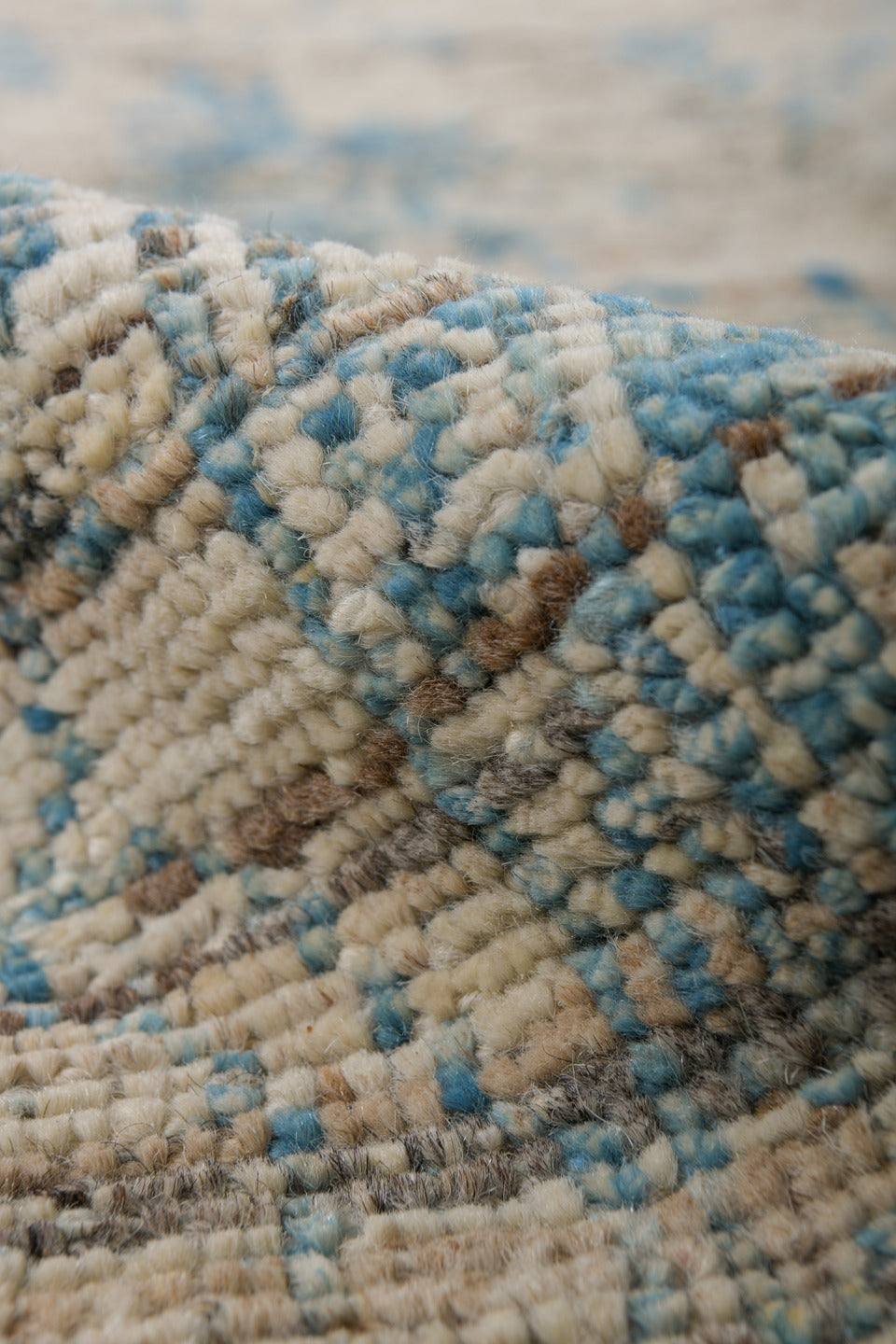 3' x 8' one-of-a-kind handmade vintage Tulu runner rug. Color palette: ivory, sky blue, charcoal, taupe, light blue, gray