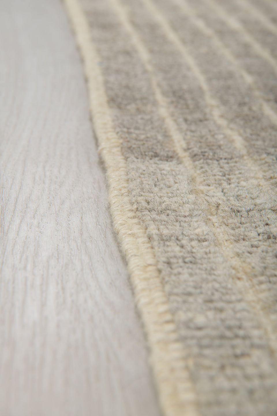 3' x 9' one-of-a-kind handmade vintage Tulu runner rug. Color palette: dim gray, gray, light gray, off-white, pink, silver