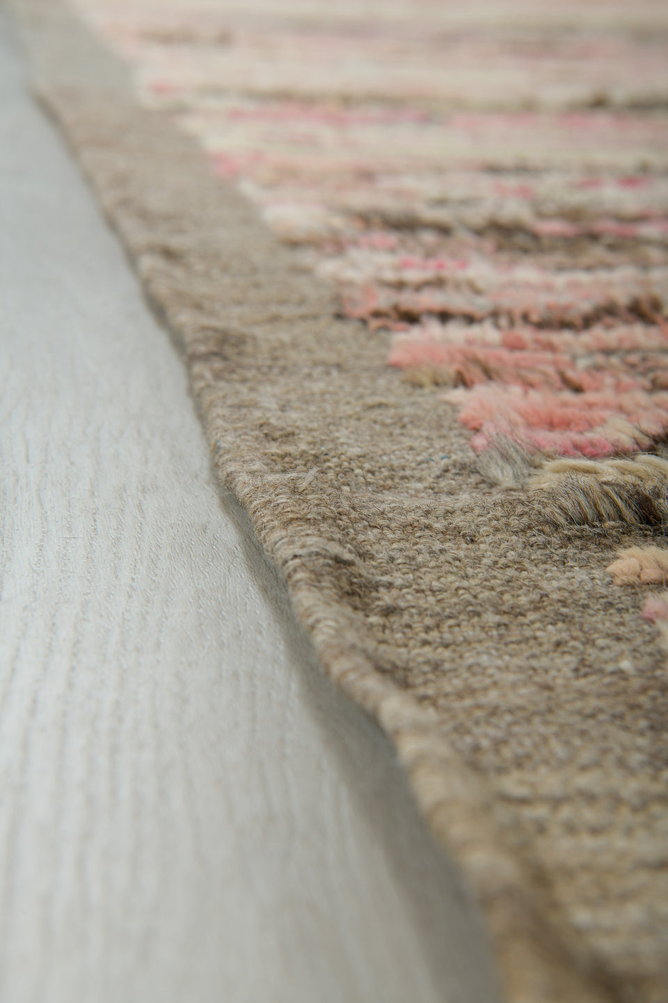 3' x 9' one-of-a-kind handmade vintage Tulu runner rug. Color palette: ivory, taupe, blush, brown, charcoal, cream, rose