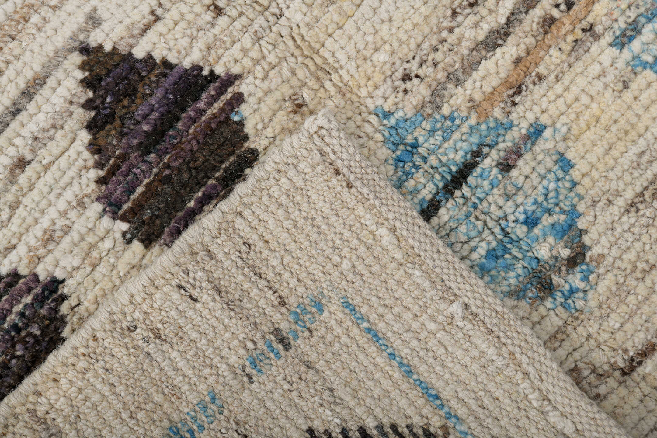 2' x 9' one-of-a-kind handmade vintage Tulu runner rug. Color palette: ivory, brown, sky_blue, taupe, charcoal, light blue