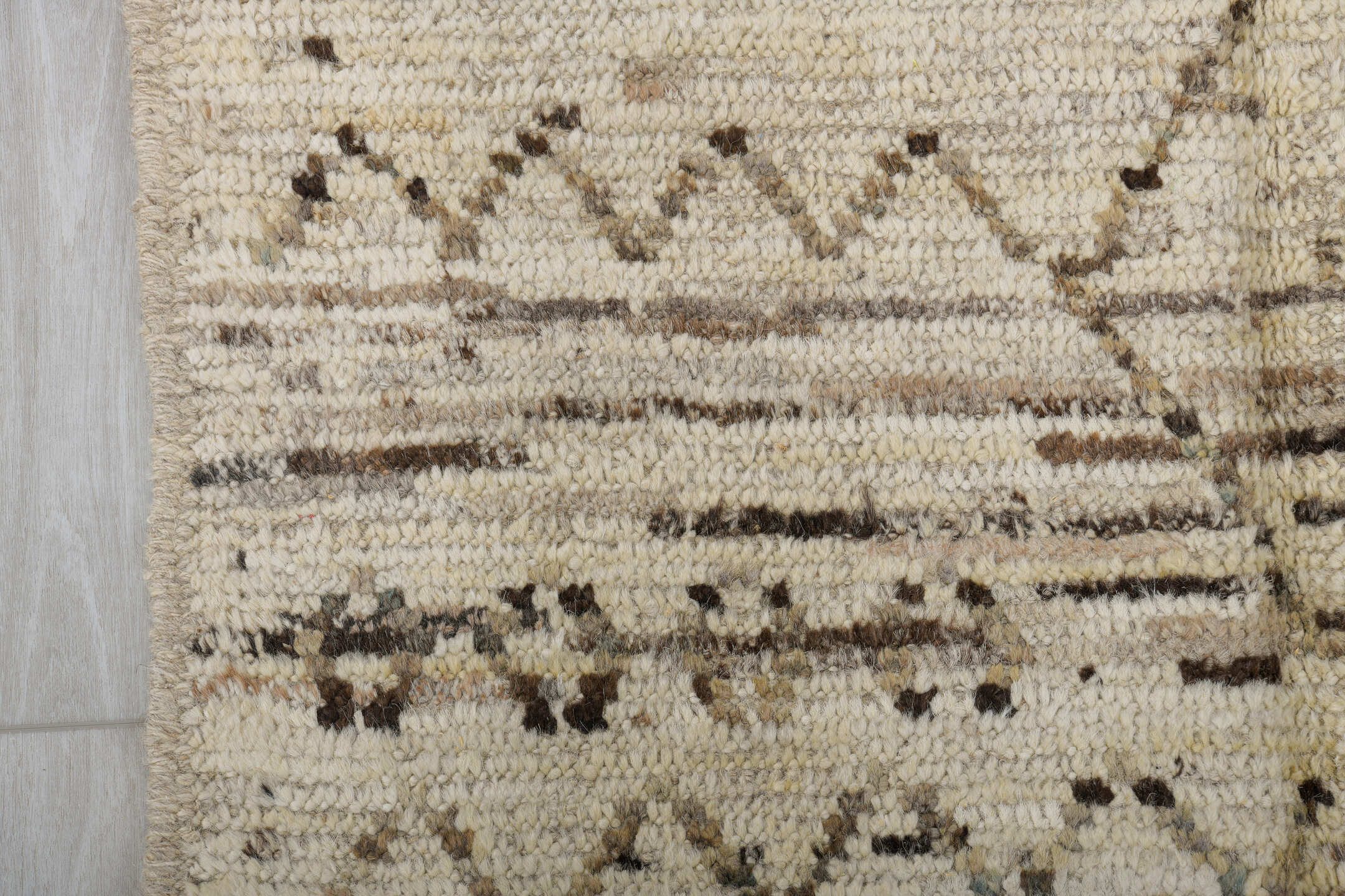 3' x 9' one-of-a-kind handmade vintage Tulu runner rug. Color palette: brown, dark gray, gray, light gray, off-white, silver