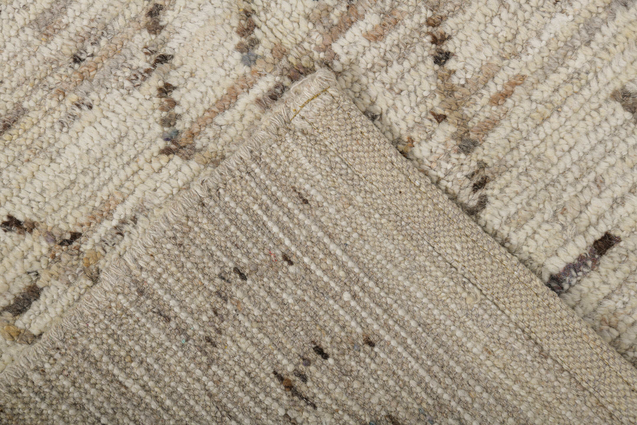 3' x 9' one-of-a-kind handmade vintage Tulu runner rug. Color palette: brown, dark gray, gray, light gray, off-white, silver