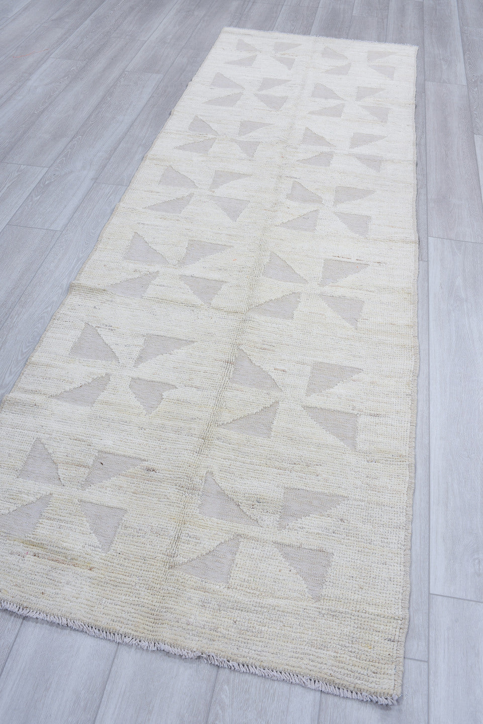 3' x 9' one-of-a-kind handmade vintage Tulu runner rug. Color palette: ivory, cream, taupe, pale gray, beige, gray