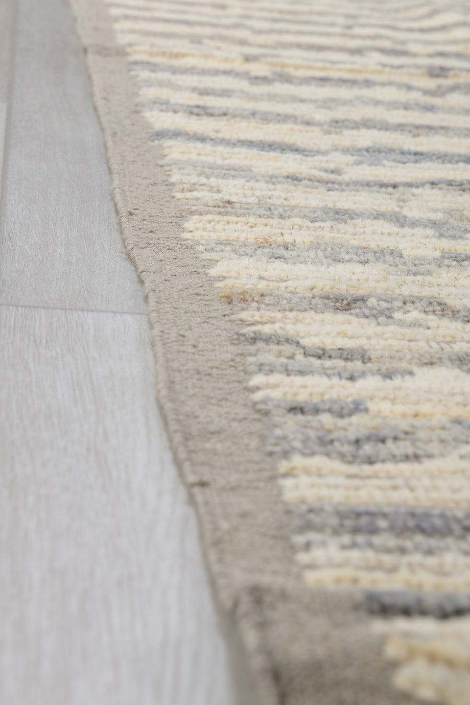 3' x 9' one-of-a-kind handmade vintage Tulu runner rug. Color palette: ivory, gray, taupe, beige